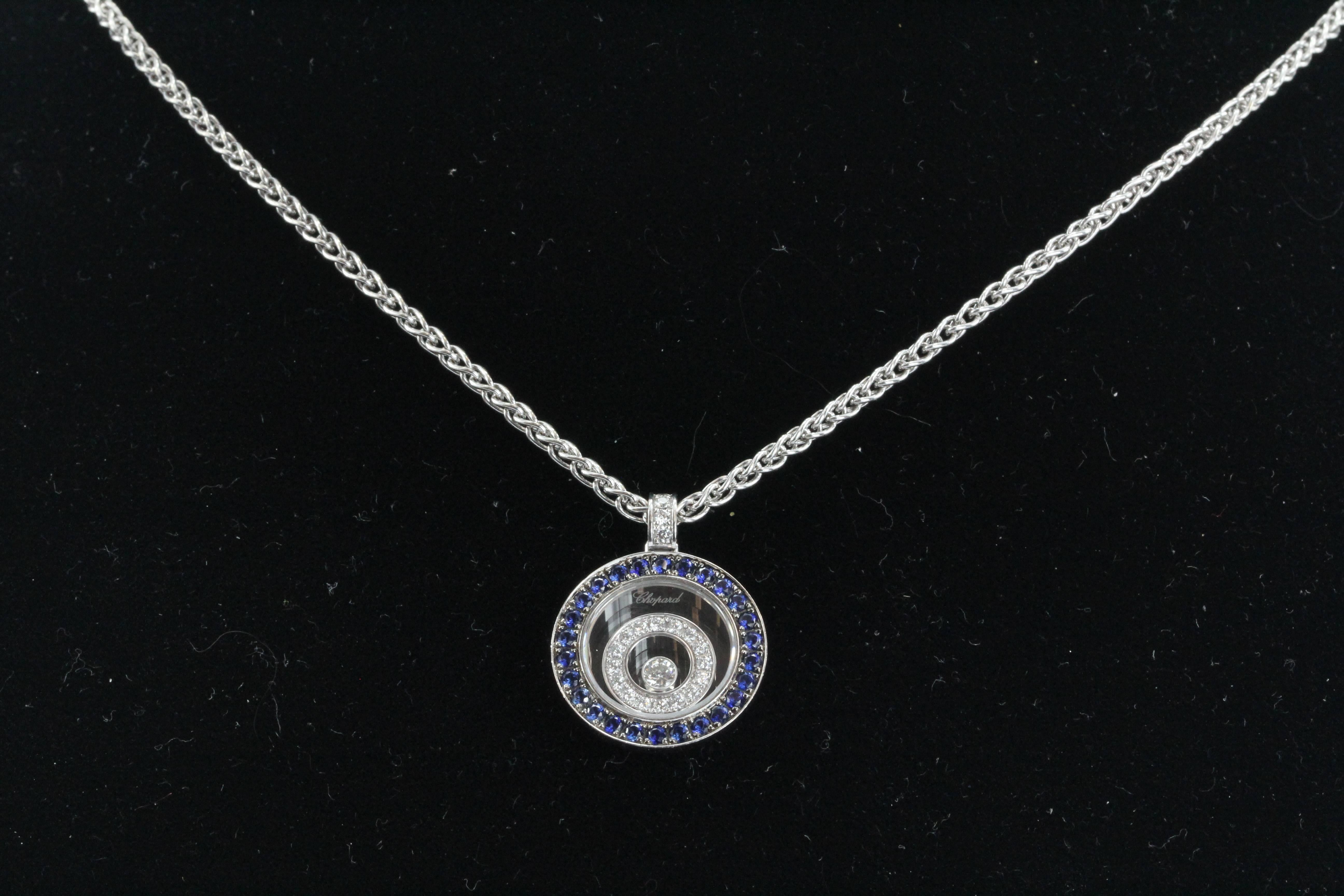 Extremely rare limited production retired Chopard Happy Spirit Pendant with Diamonds and Sapphires.

Model number = 79/5422/3-20

Originally retailed 15 years ago for $8,660

Specifications:
18kt White Gold Chopard Pendant
26 sapphires =