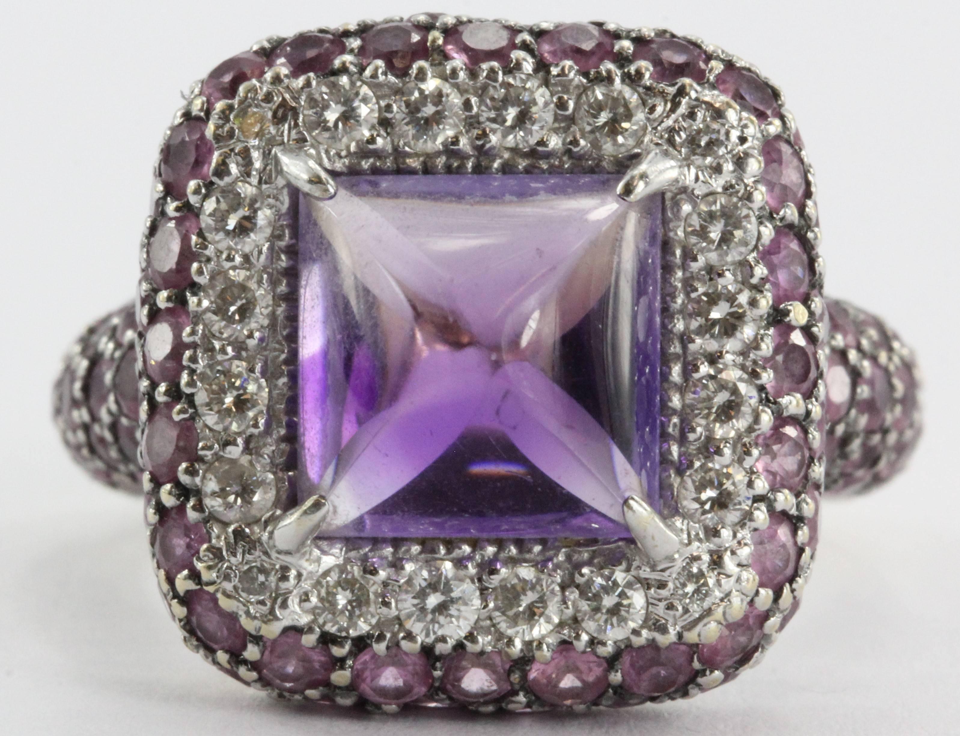 18k White Gold Sugarloaf Amethyst, Diamond, & Pink Sapphire Chunky Ring

Amethyst: 4 Carat Sugarloaf

Diamonds:

F Color

Vs1 Clarity

1 carat total weight

Pink Sapphires: 2 Carats total weight

Total Carat Weight: 7 carats

Ring