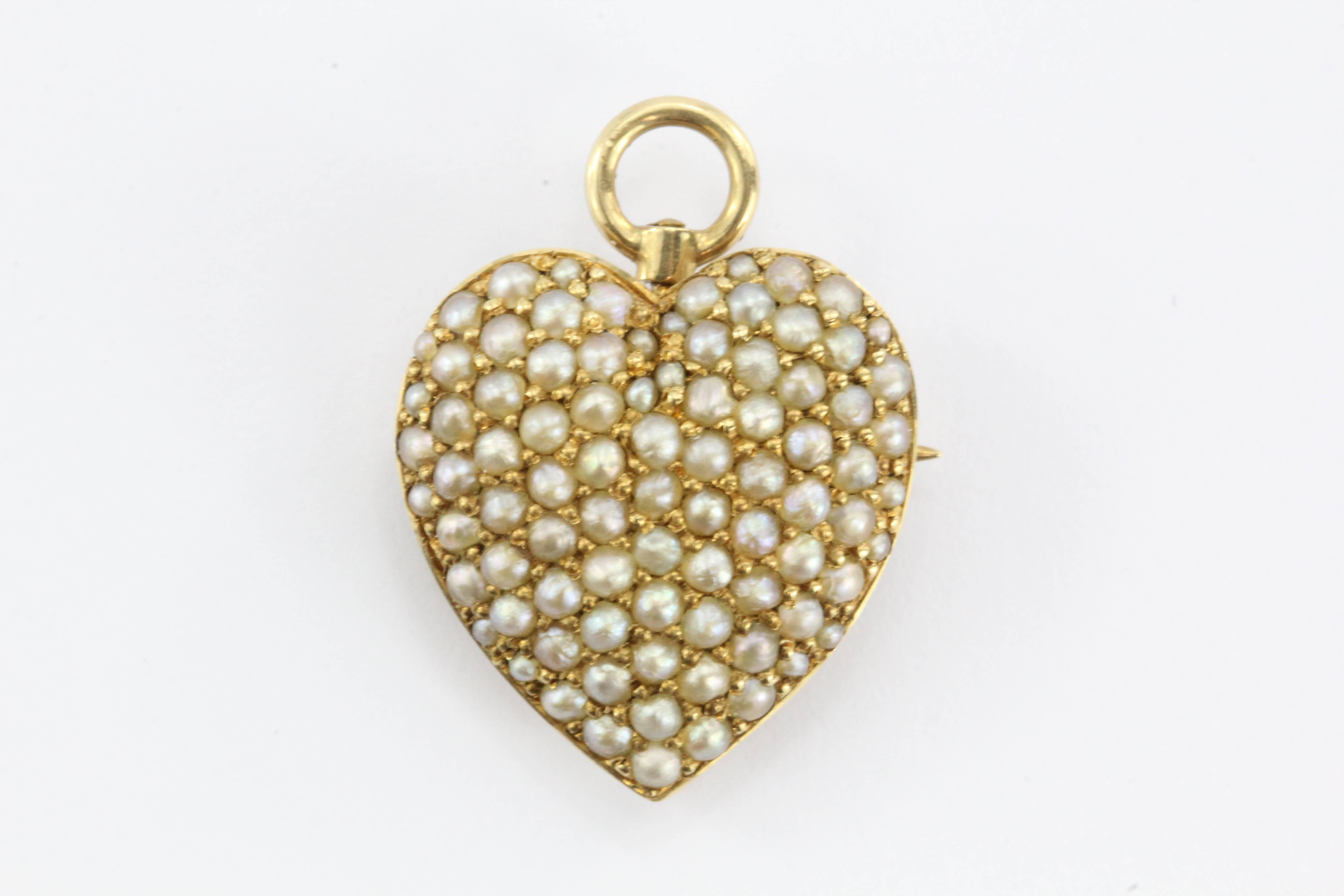 Antique Art Nouveau 14K Gold & Seed Pearl Studded Heart Pendant, Pin Hallmarked. The piece is in amazing antique estate condition. It still has all of its original seed pearls with no replacements. It also has all its original parts. It can be worn