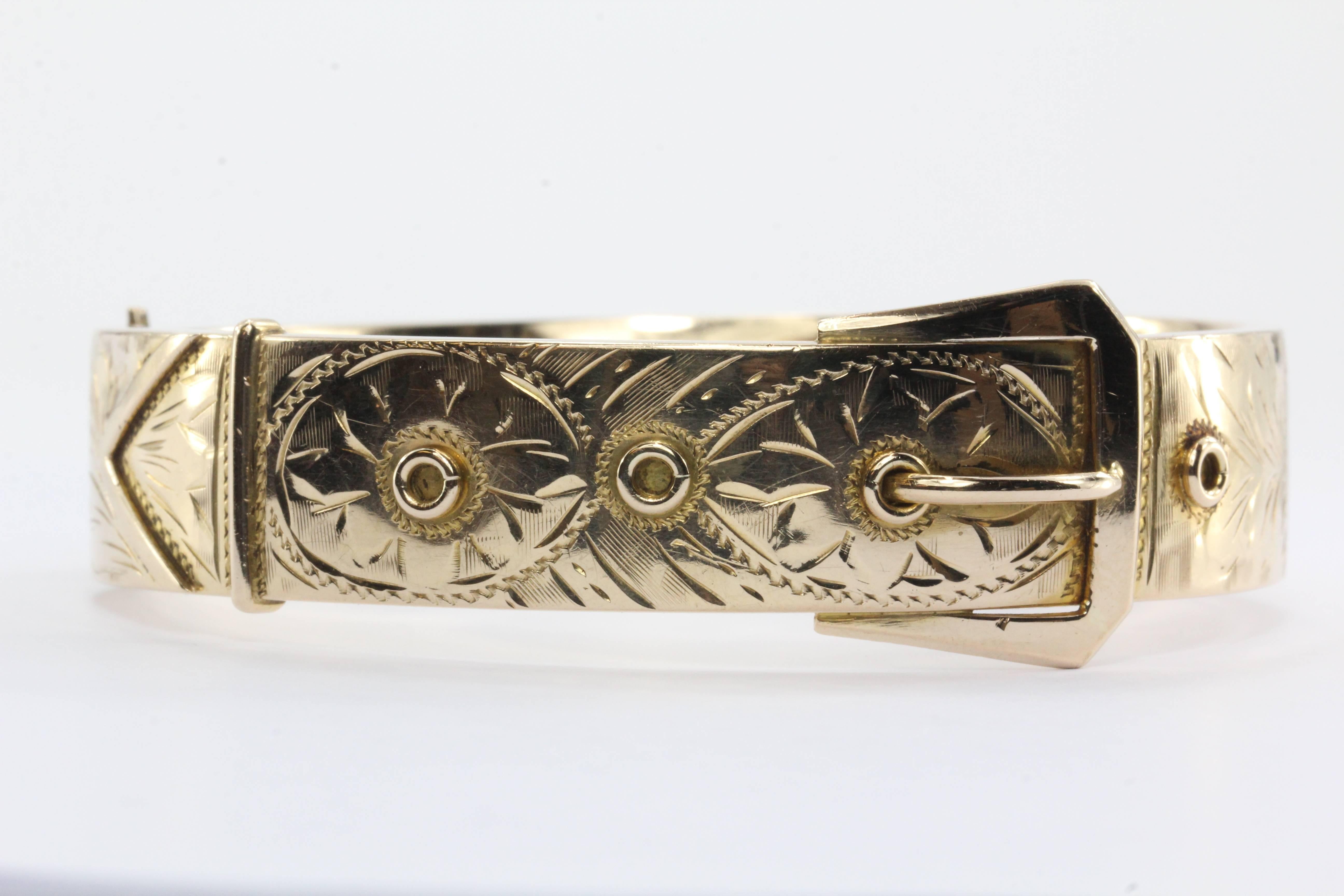 Antique 1918 Edwardian 14K Gold Belt Buckle Large Chunky Bangle Bracelet. The bracelet is in great antique estate condition and ready to wear. There are a couple very faint dents to the back of the bracelet. The piece is signed 14K COWEN 1918. The