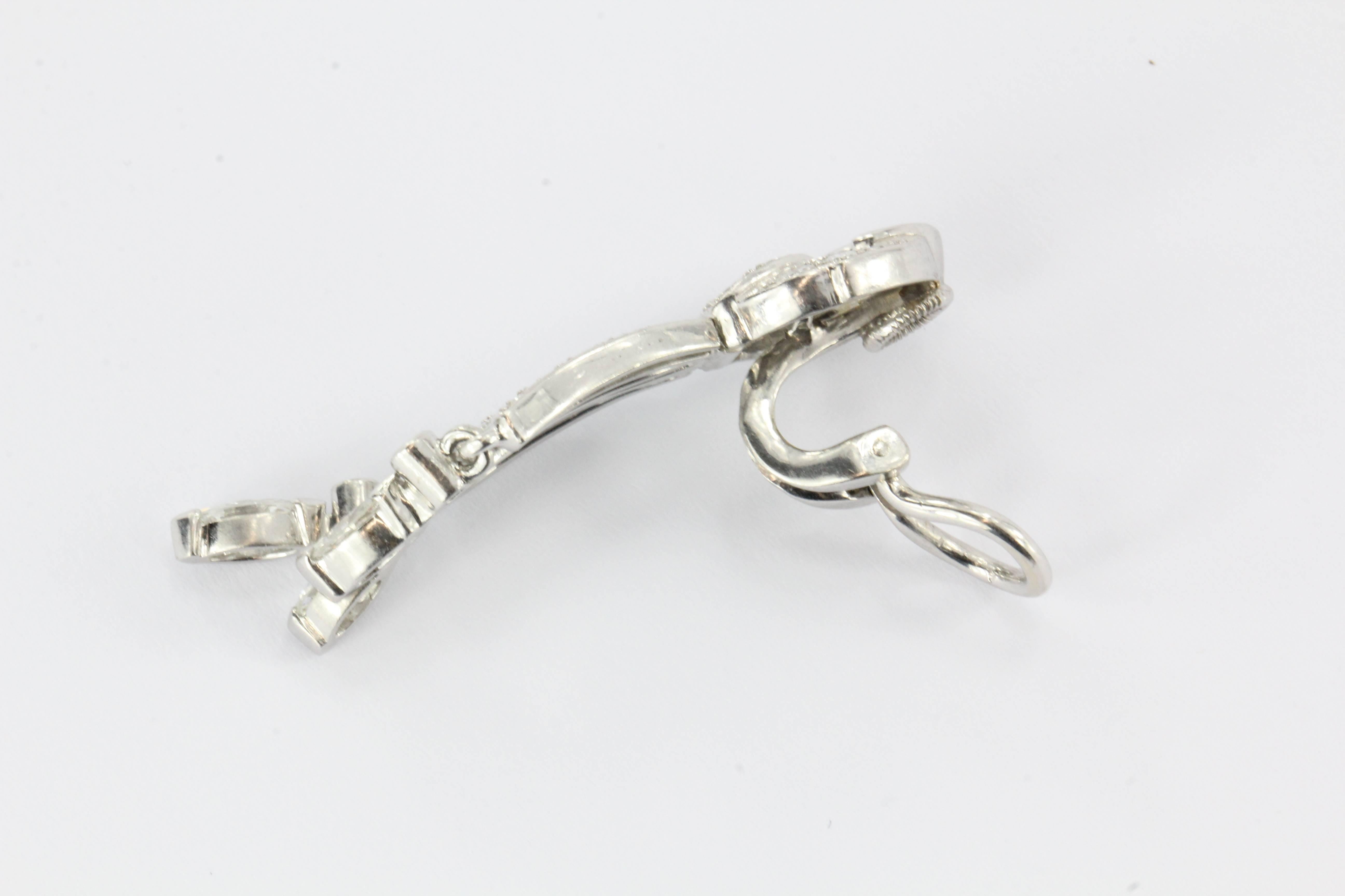 These exquisite antique JE Caldwell diamond and platinum earrings are sure to light up any event. They exude a carefree attitude as they dance and sparkle with abandon. 

Each platinum earring features 37 diamonds for a total approximate weight of