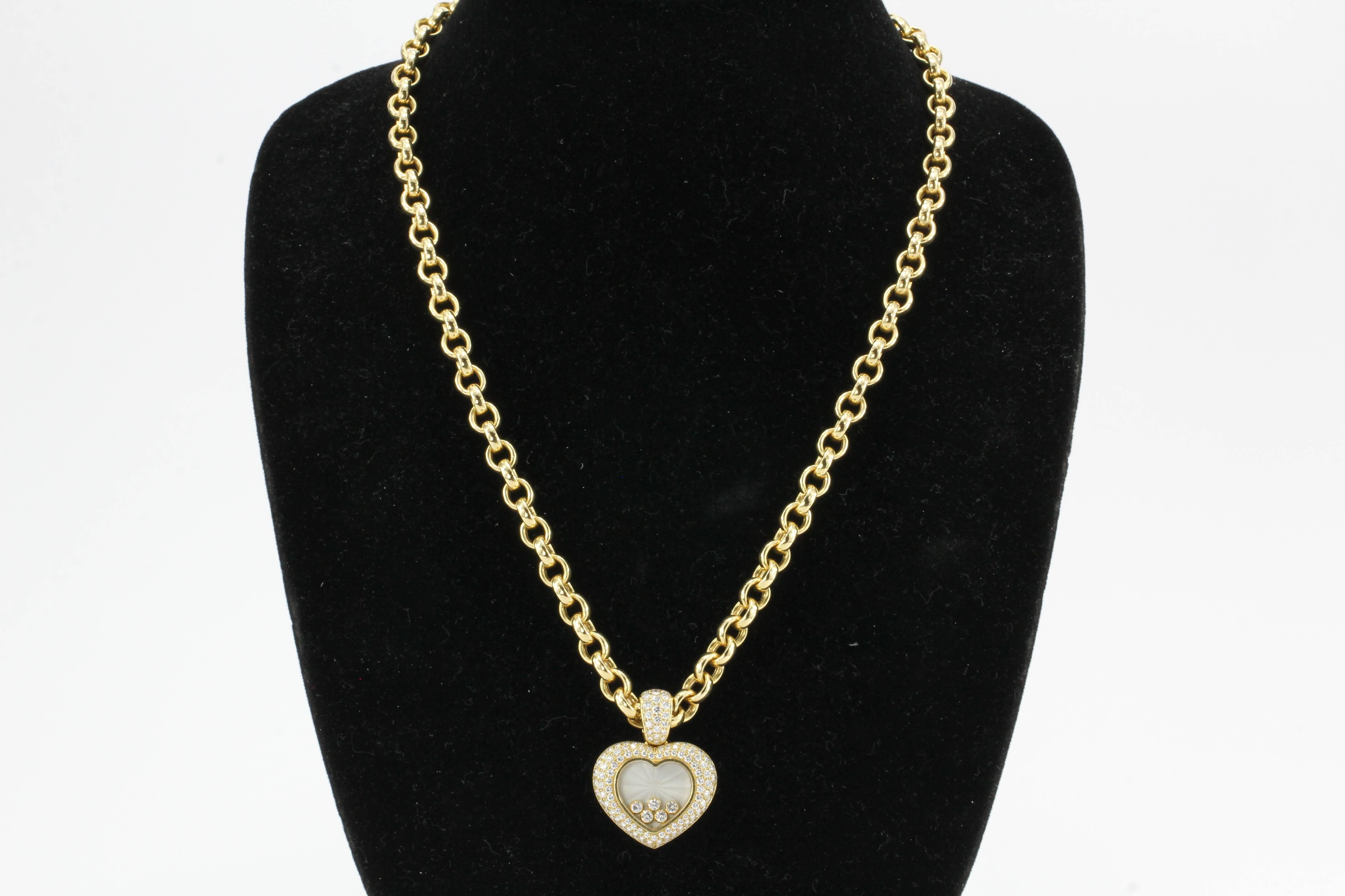 Chopard 18K Gold Happy Diamonds Heart Pendant & Chain

The piece is in excellent gently used estate condition and ready to wear. The chain measures 23" long x 7.7mm wide, the pendant measures 1.5" long x 1.15" wide. The floating