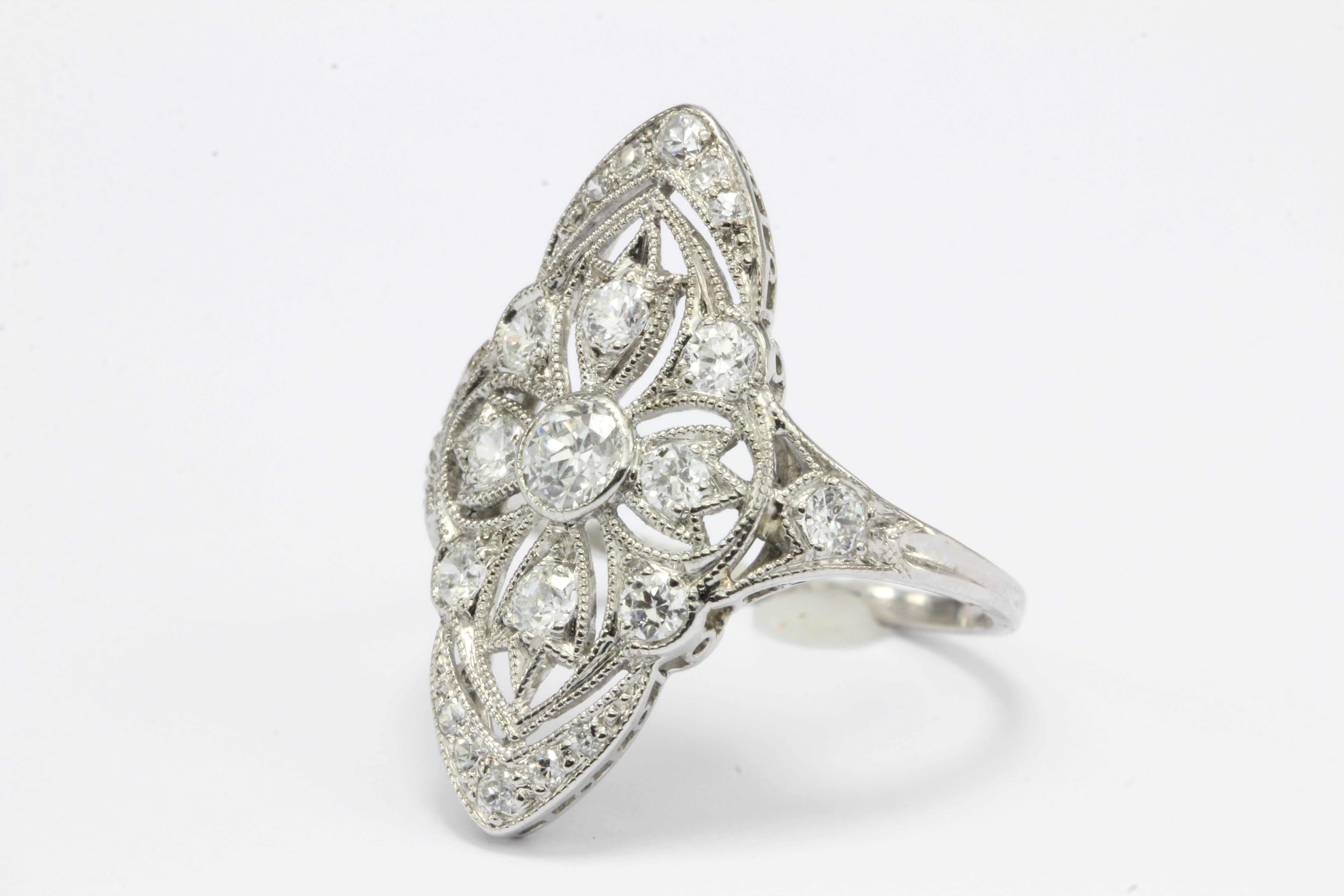 Era: Art Deco

Composition: Platinum 

Primary Stone: Diamonds

Stone Carat: .80 CTW

Color: F/G

Clarity: VS 1/2

Shape: Old European Cut

Ring Size: 5.25

Ring Weight: 3.34 grams

Ring Condition: Excellent Condition