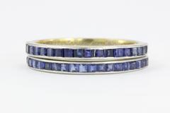 Tiffany & Co. Pair of Sapphire Platinum Half Eternity Band Rings, circa 1945