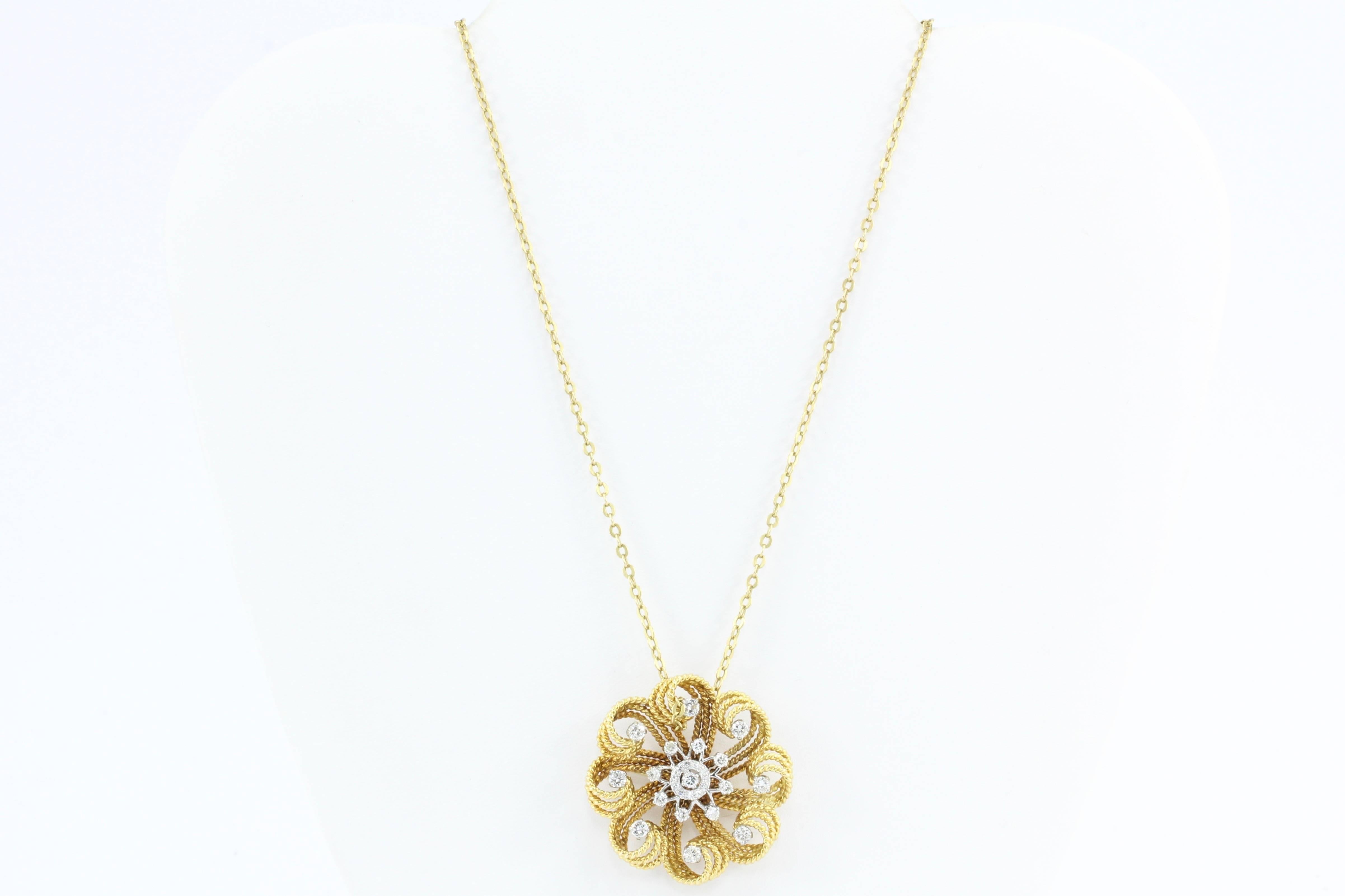 Retro 18K Gold Diamond Flower Swirl Pendant Necklace

Curling petals of twisted 18K yellow gold tipped with diamonds surround an 18K white gold and diamond center on this fabulous retro pendant / brooch. The piece can be worn as a pendant or as a