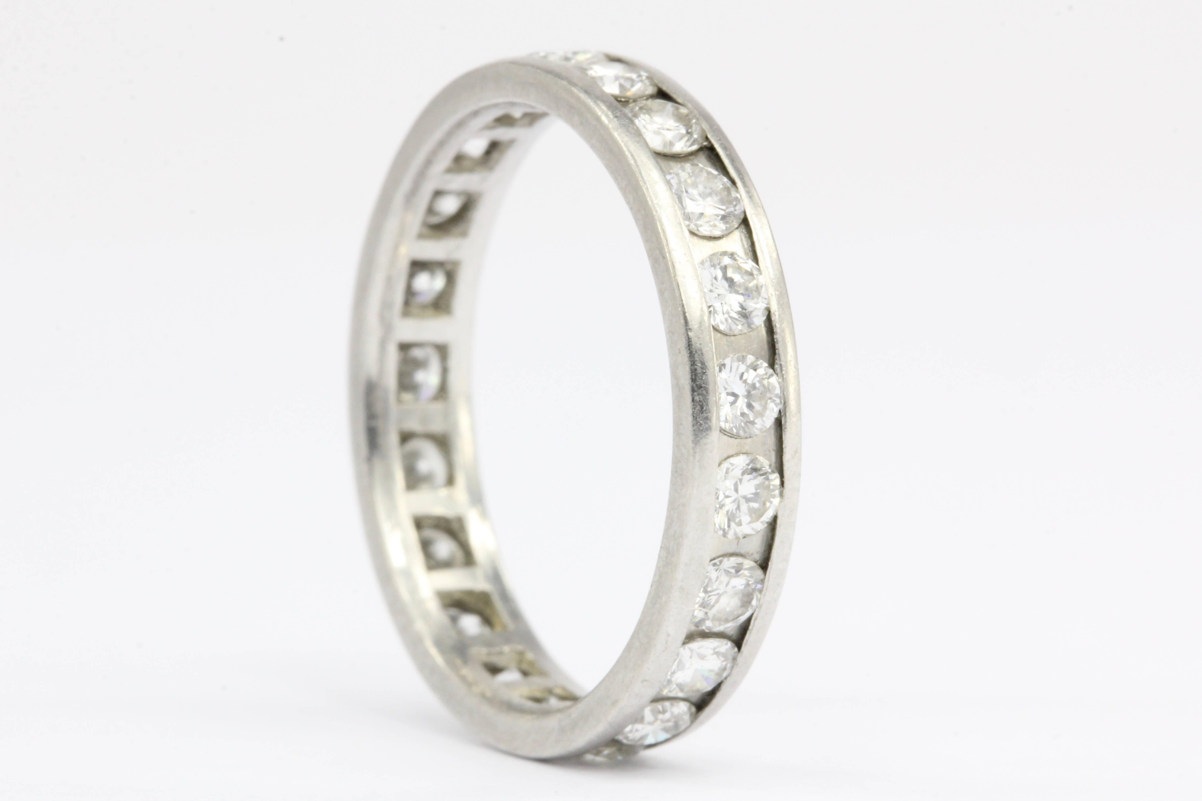Era: Modern

Composition: Platinum

Primary Stone: Diamonds

Stone Carat: 1 CTW

Color: H/I

Clarity: Vs1/2

Band Width: 4 mm wide

Rise Above Finger: 1 mm thick

Ring Size: 6.25

Ring Weight: 4.04 grams

Ring Condition: Excellent estate condition.