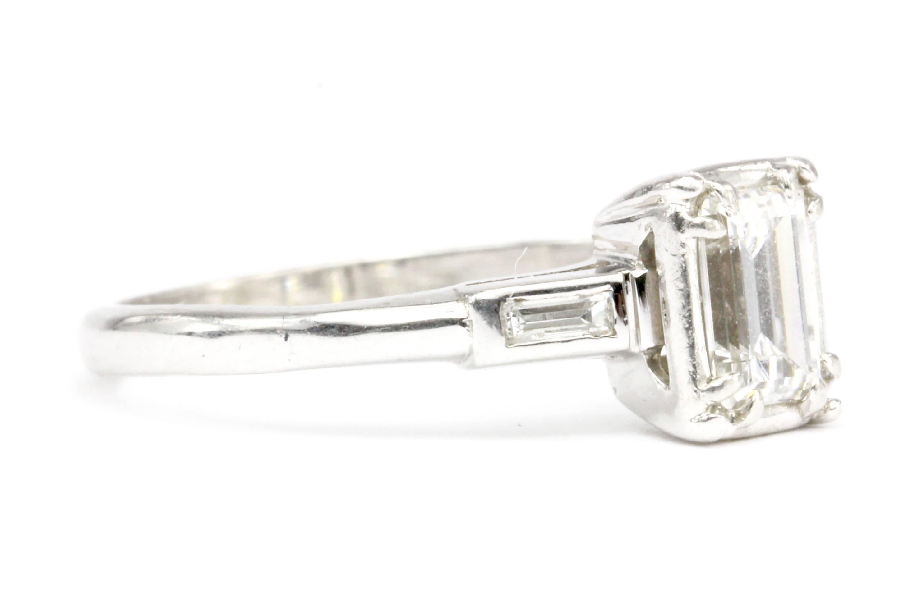 Art Deco White Gold .52 Carat Emerald Cut Engagement Ring In Excellent Condition In Cape May, NJ