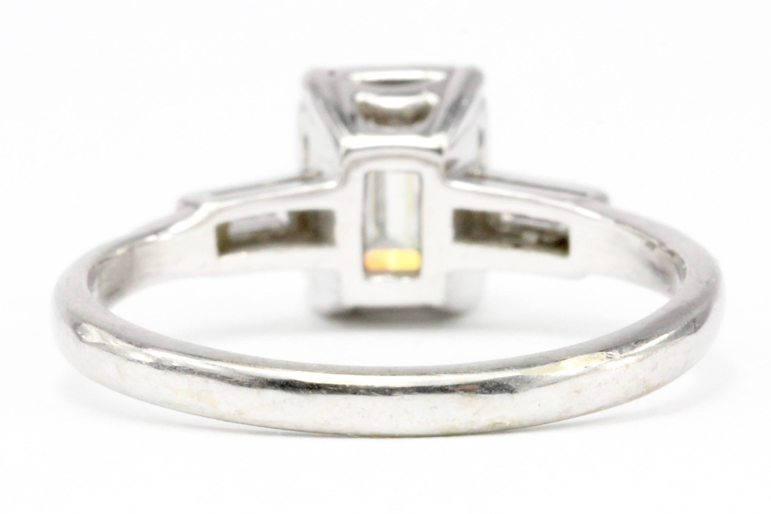 Women's Art Deco White Gold .52 Carat Emerald Cut Engagement Ring