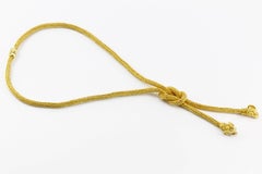 Ilias Lalaounis 18 Karat Yellow Gold Diamond Ruby Hercules Knot Necklace