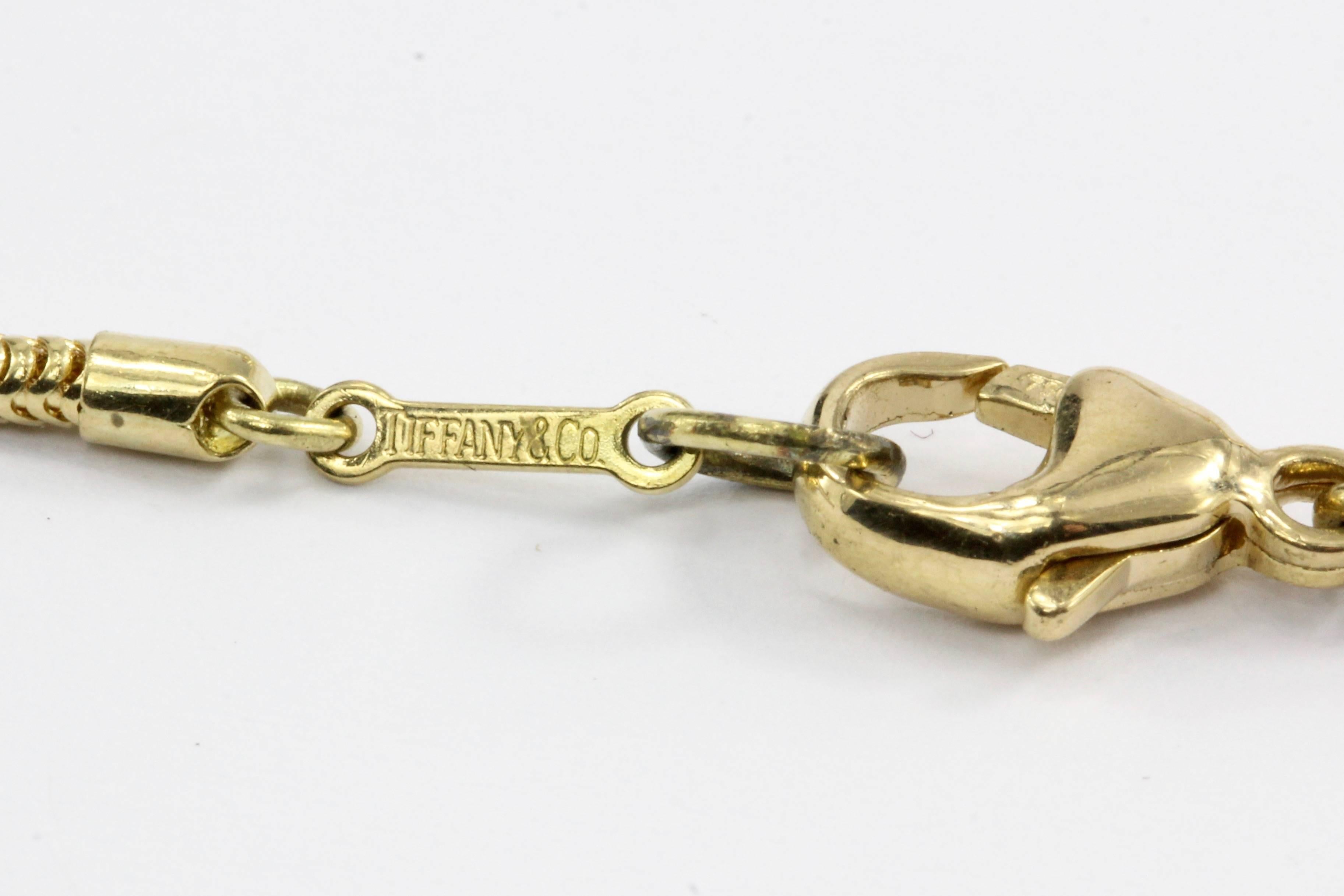 Tiffany & Co. Paloma Picasso 18 Karat Yellow Gold Gemstone Cross Necklace 2