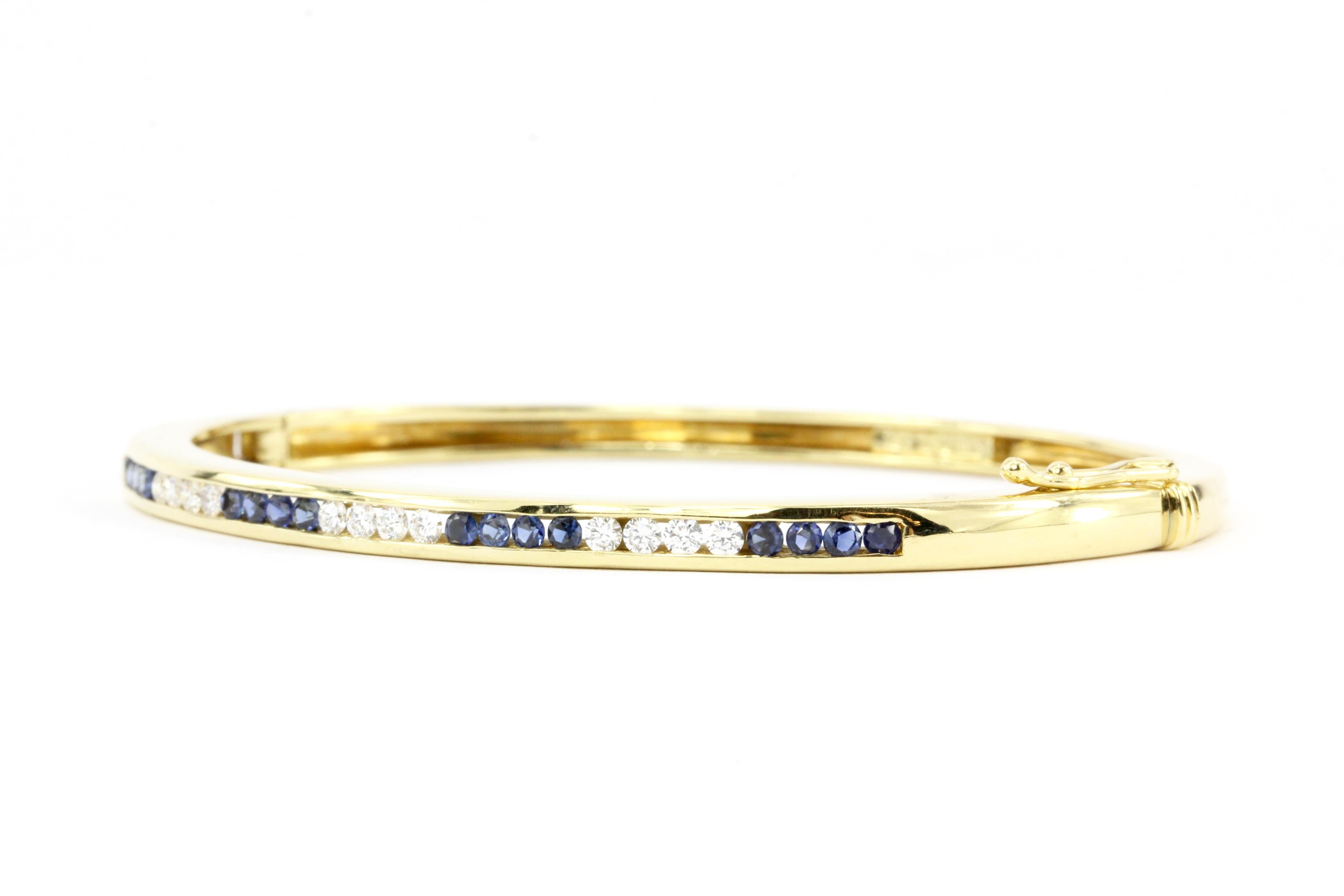 Hallmarks: TIFFANY&CO 750

Composition: 18K Yellow Gold

Primary Stone: Sapphires

Stone Carat: Approximately .5 Carats Total Weight

Shape: Round

Accent Stone: Diamonds

Total Diamond Weight: Approximately .4 carats

Bracelet length: 7.25 inches