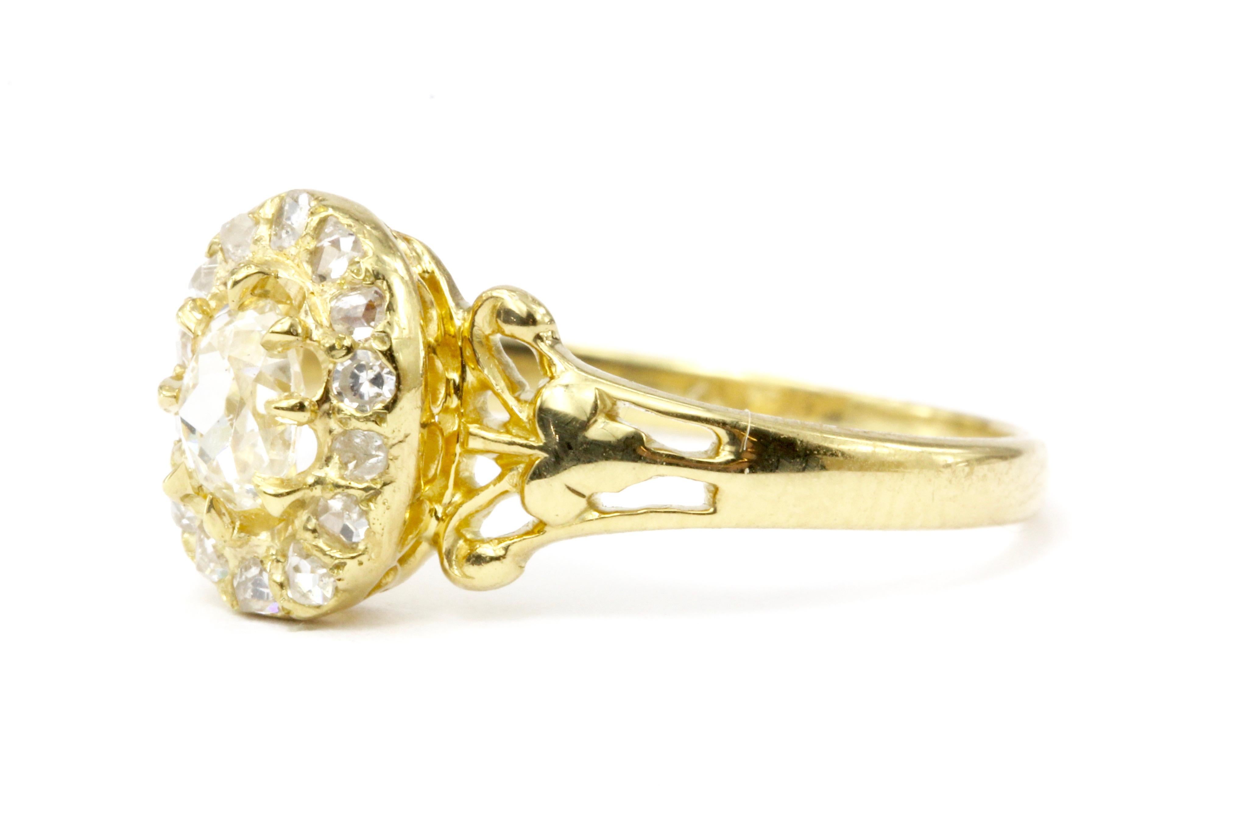 Era: Victorian c. 1890's

Composition: 18K Yellow Gold

Primary Stone: Diamond

Stone Carat:  Approximately .25 carats

Color / Clarity: J / VS2

Shape: Antique Oval Cut

Accent Stone: Rose Cut Diamonds

Total Diamond Weight: Approximately .14