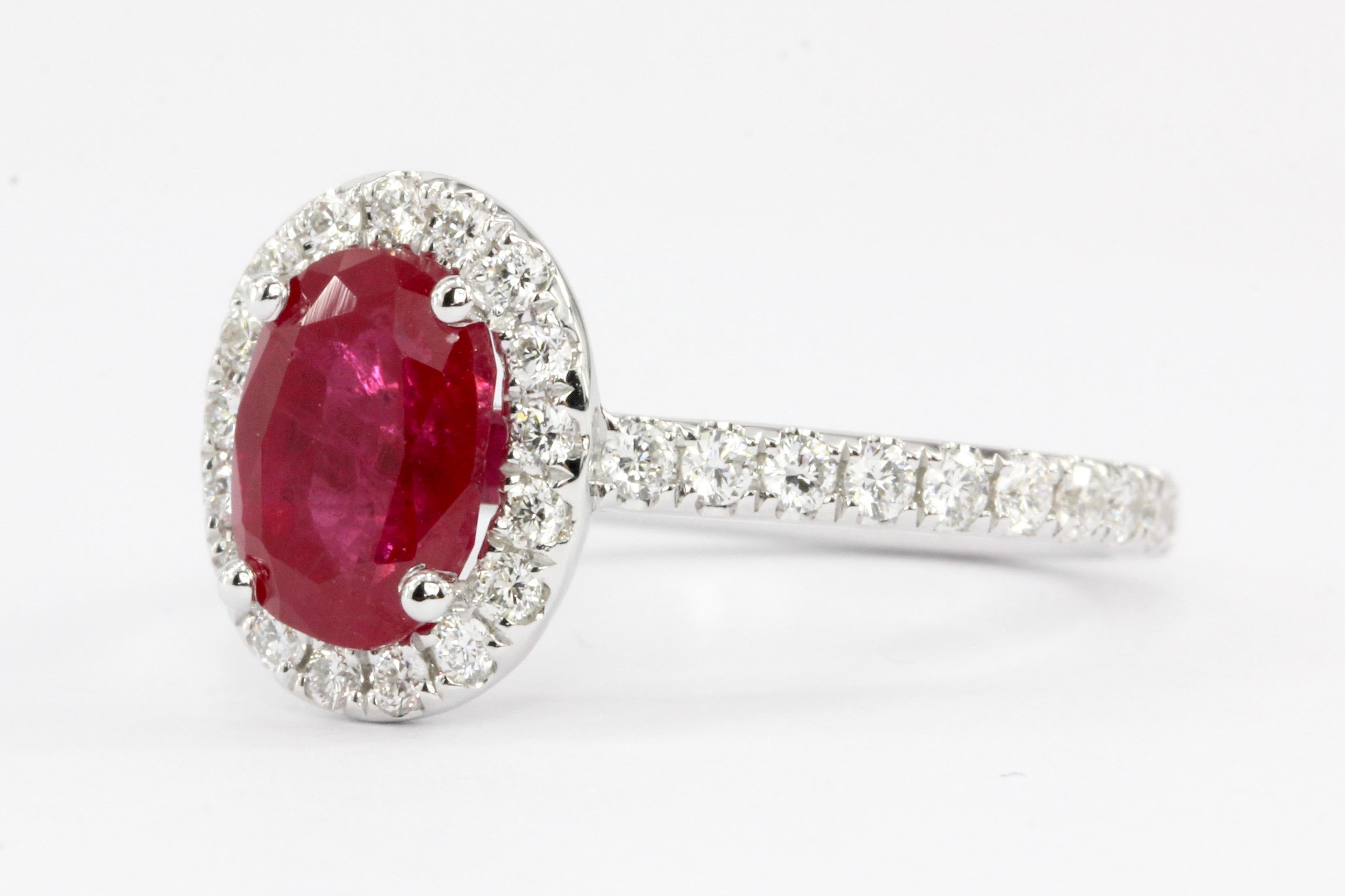 Era: Modern

Composition: 14K White Gold

Primary Stone: Natural Ruby

Carat Weight: 2.07 Carat 

Secondary Stone: Diamond

Carat Weight: .54 CTW

Color: G/H

Clarity: Vs2/Si1

Size: 6