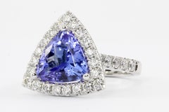 White Gold 4 Carat Trillion Cut Tanzanite and Diamond Halo Ring