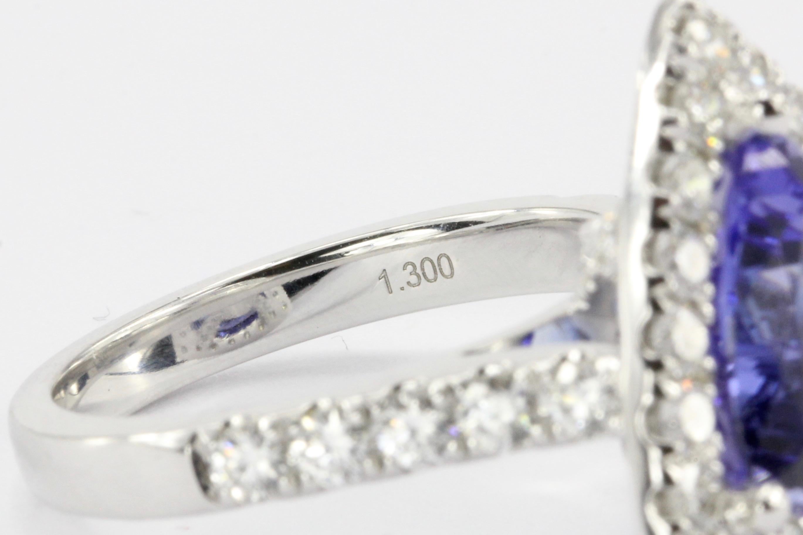 Women's White Gold 4 Carat Trillion Cut Tanzanite and Diamond Halo Ring
