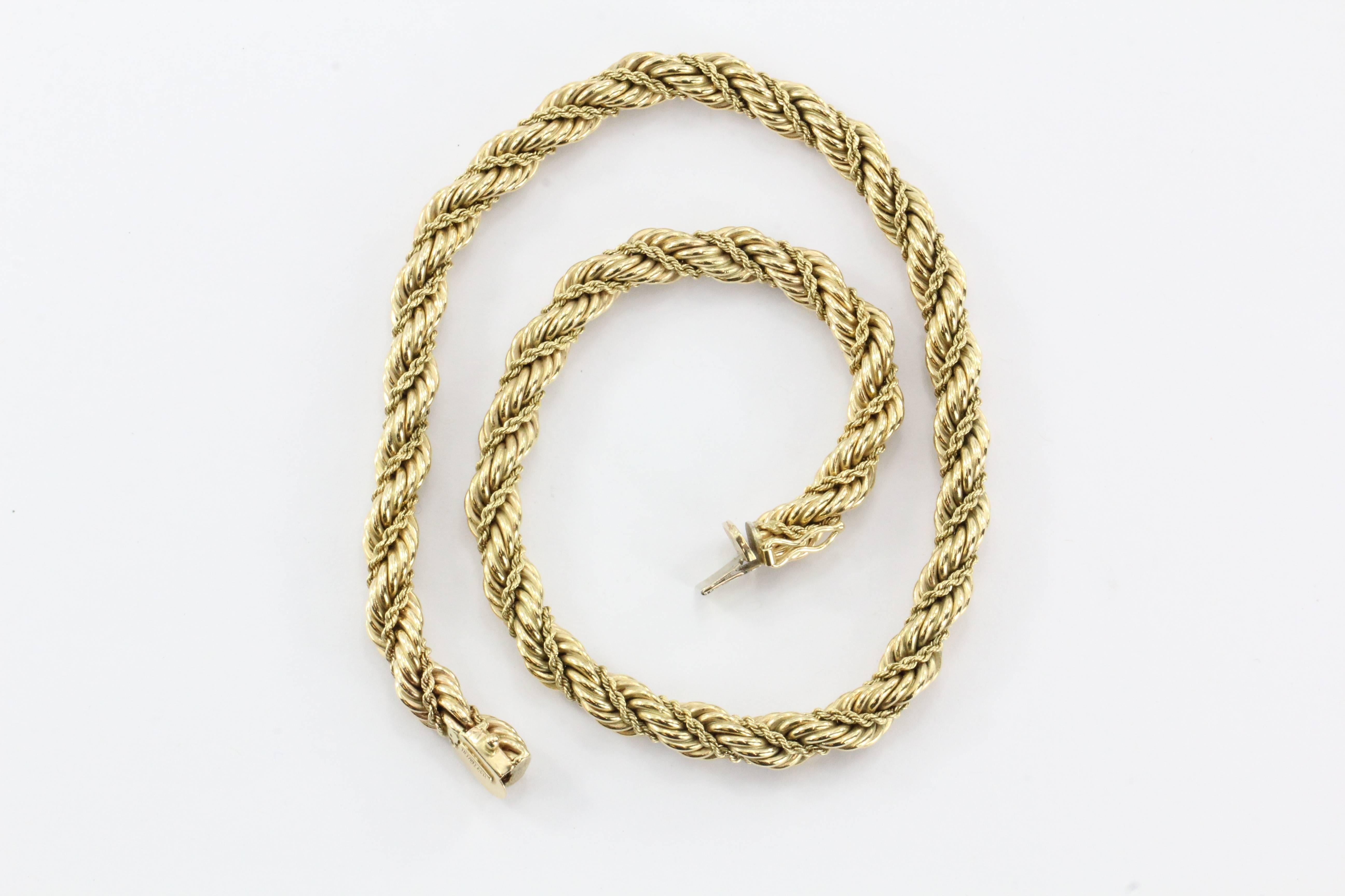 Tiffany & Co. 14K Gold Thick Rope Necklace. The necklace is in excellent estate condition and ready to wear. It is hallmarked TIFFANY & CO 585 on the clasp. The piece does not come with a pouch or box.

The necklace measures 16.5"