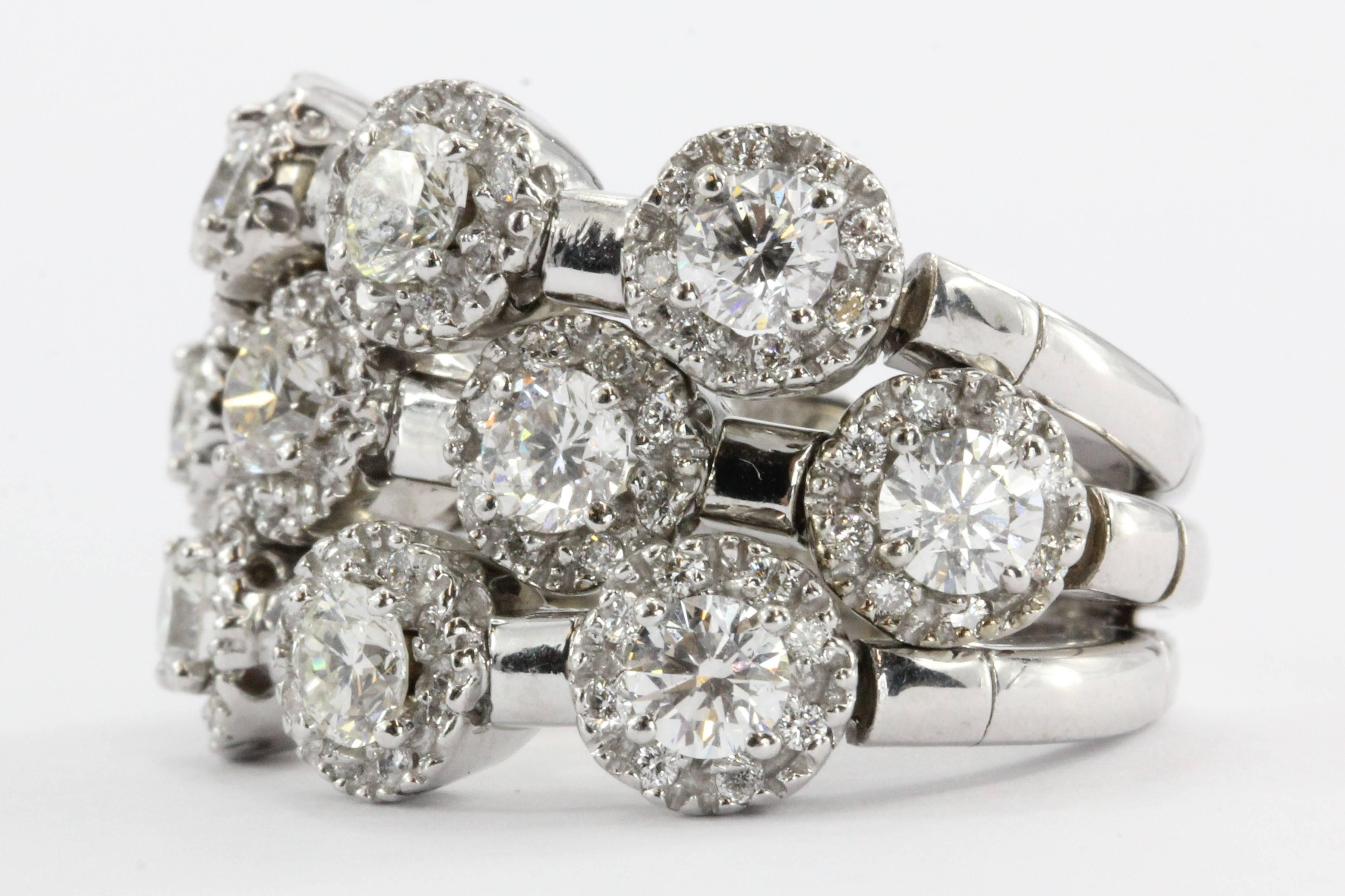 14K white gold Flex ring by Sonia B set with approximately 2.72 carats of G/H color, Si1 clarity diamonds. The ring is in excellent estate condition and ready to wear, it was recently professionally cleaned and re-plated with rhodium. The ring is