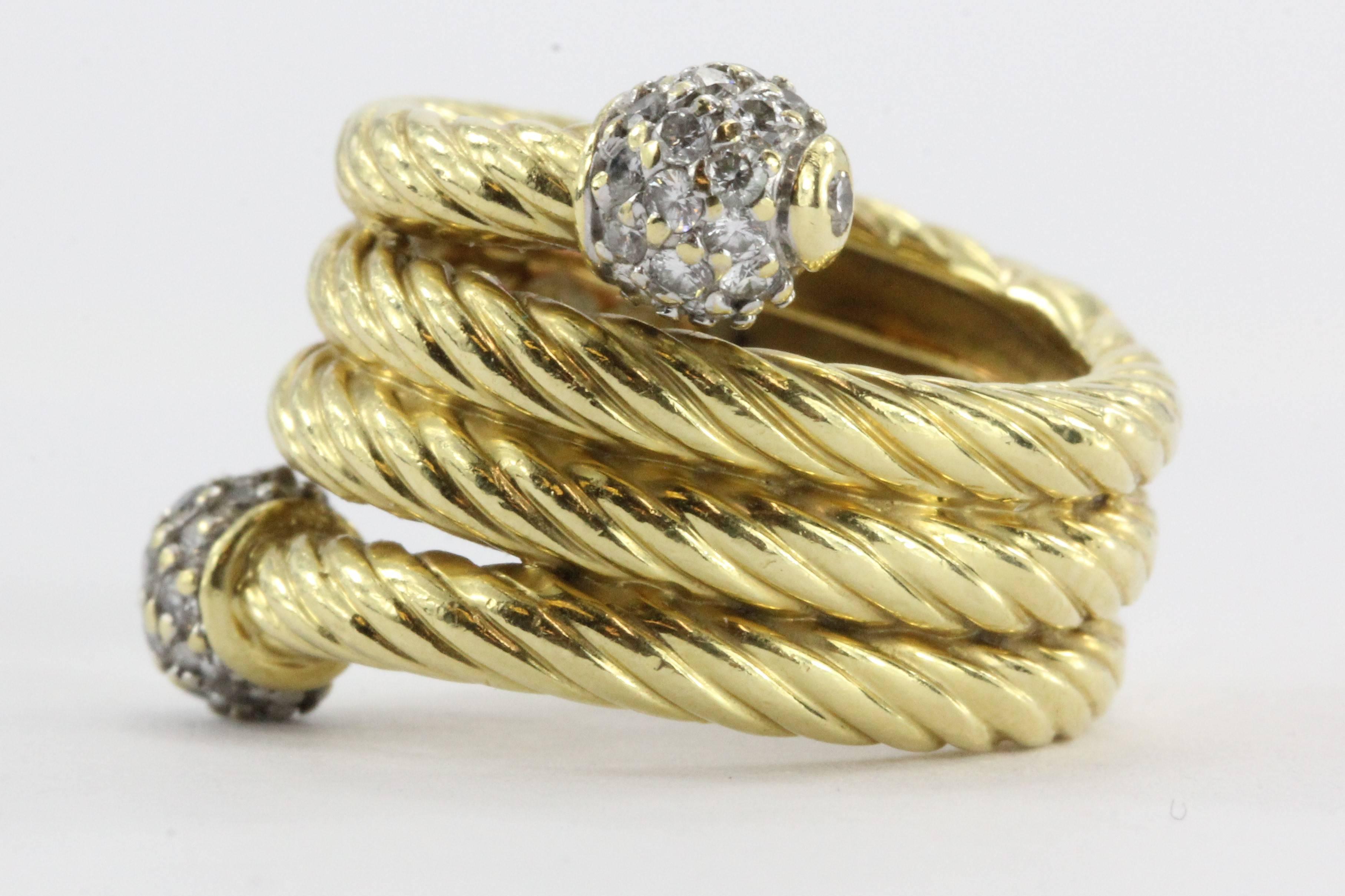 Estate David Yurman 
18K Yellow Gold Spiral Serpentine Diamond Ring 
Hallmarked D.Y. 750 
Diamonds 0.40 ctw Clarity: VS Color: H
Measurements: Ring size 4.25-4.5
Widest Point 1/4 inch
Weight: 13.0 grams

The ring is in excellent estate