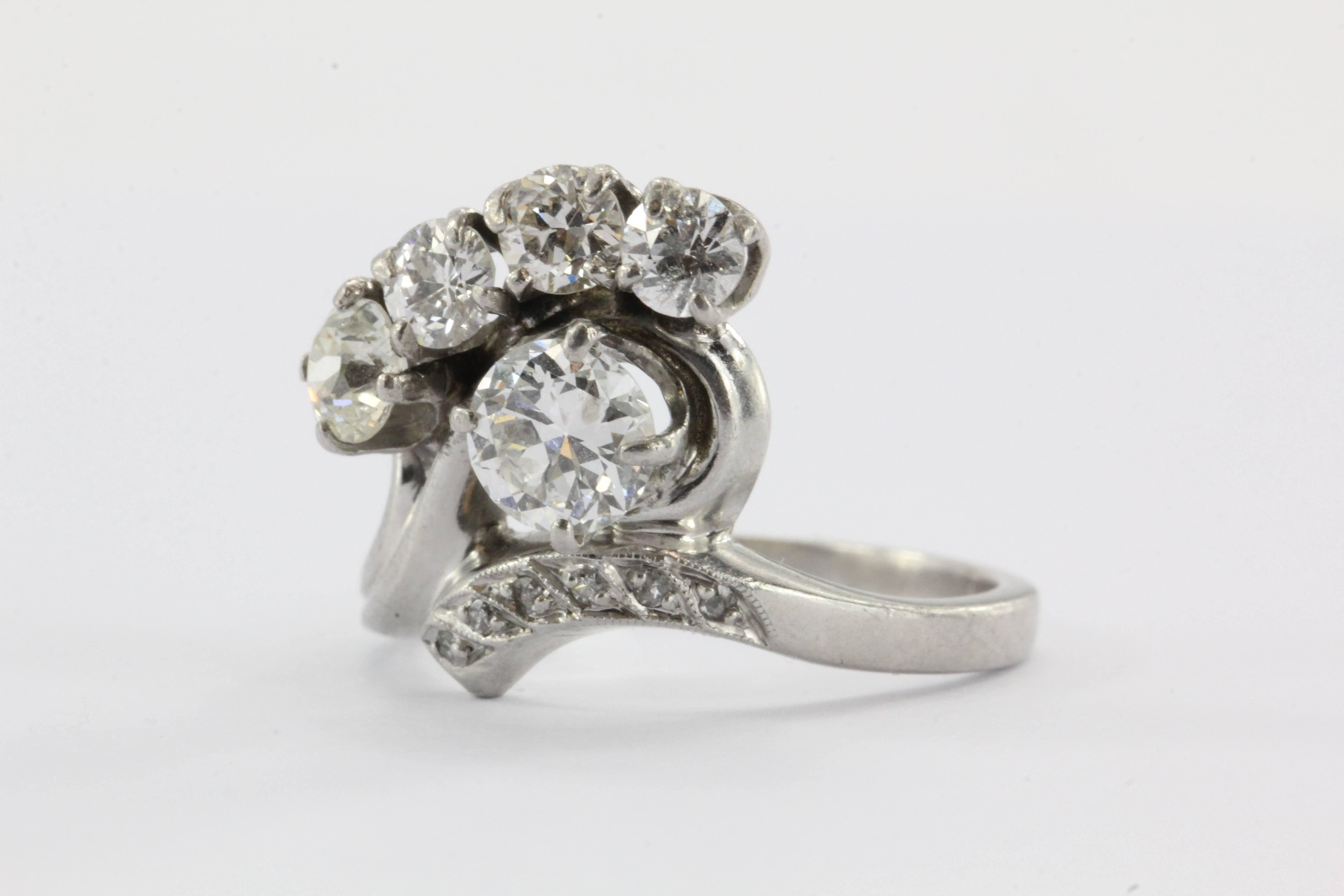 Vintage Art Deco Platinum 2 ctw Diamond Ring by Byard Brogan of Philadelphia. The ring is in excellent estate condition and ready to wear. It is signed PLATINUM and the Byard Brogan B mark. Byard Brogan was founded in Philadelphia in 1908. The ring