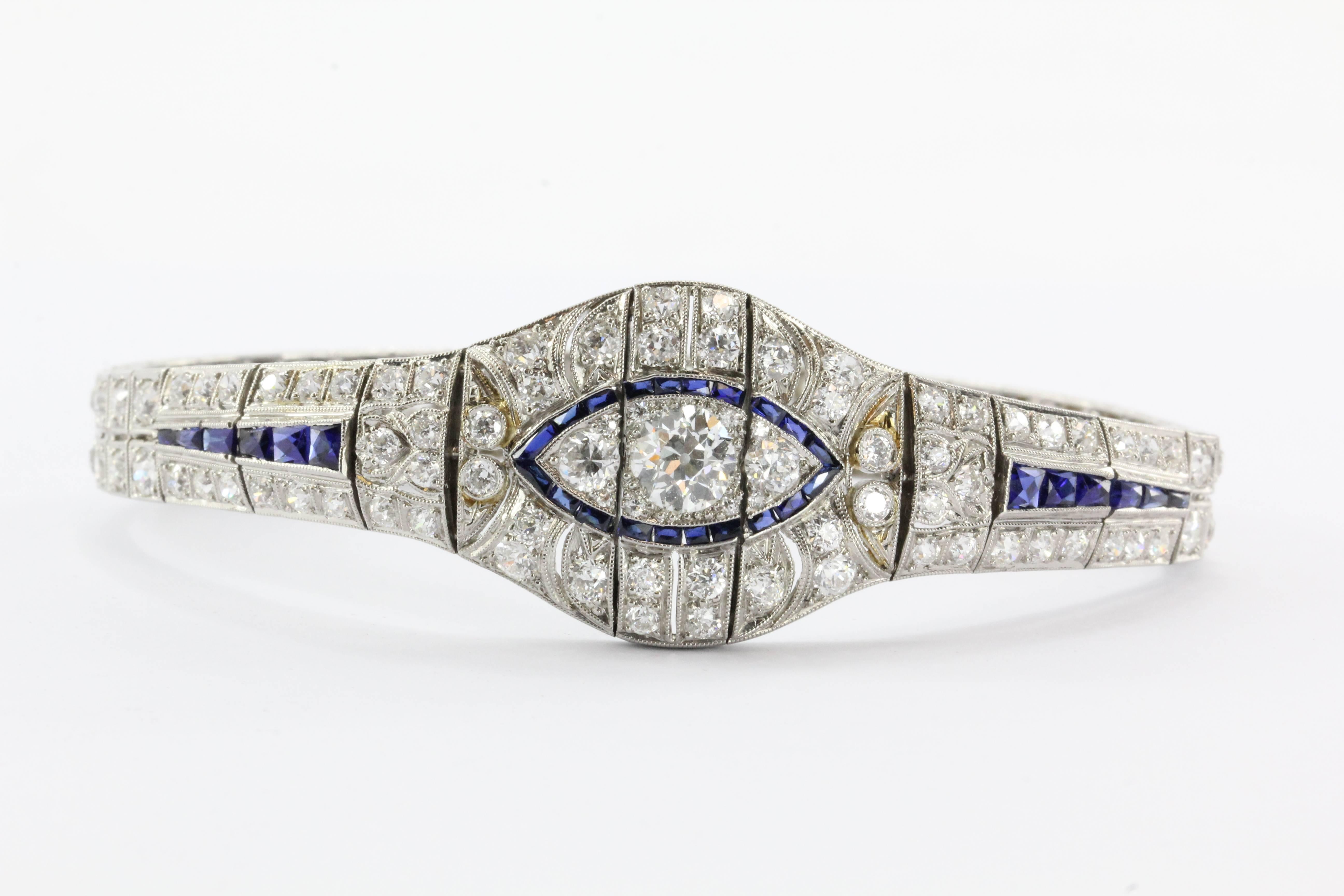 A genuine very high quality Art Deco Platinum Bracelet with 10 Carats of Diamonds & Sapphires. The bracelet is in excellent original estate condition and ready to wear.  The bracelet appears in such great condition that it may have only been