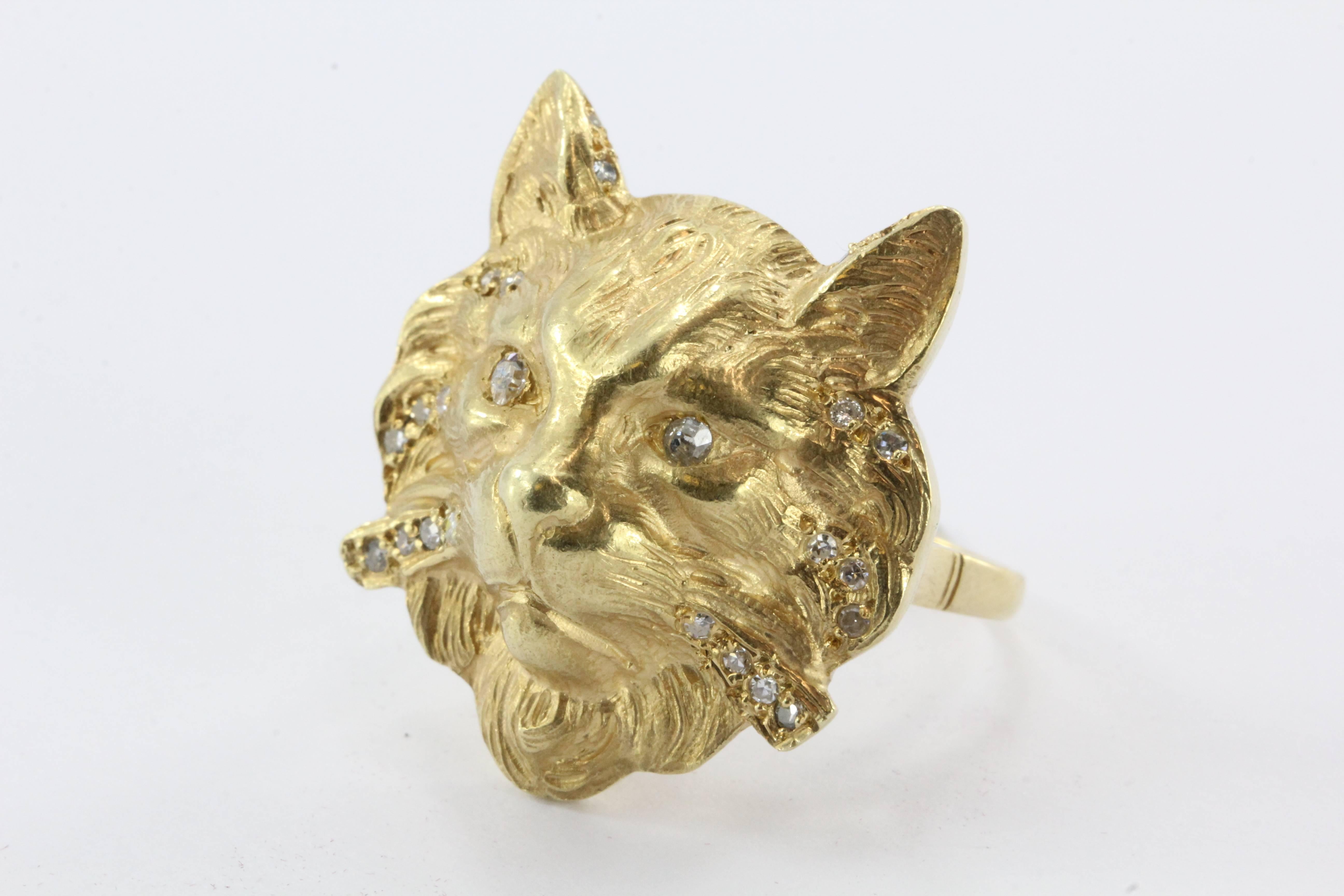 18K Gold & Diamond Large Chunky Cat Face Ring. The ring is in excellent estate condition and ready to wear. The piece is made of 18K yellow gold and set with approximately .25 carats of single cut diamonds highlighting the eyes and whiskers. The cat