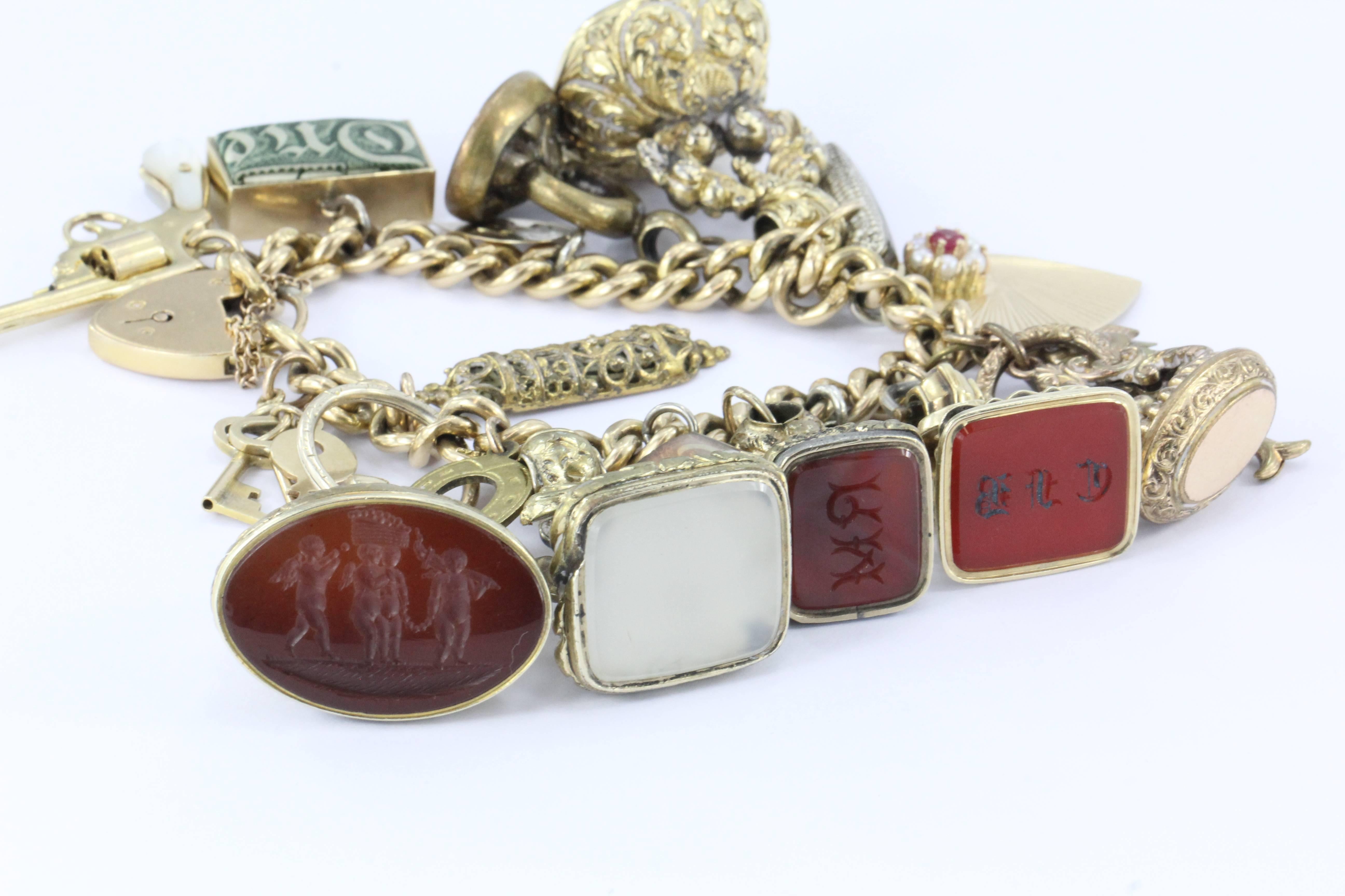 Unique Gold English Tassie Seal Loaded Charm Bracelet In Good Condition In Cape May, NJ