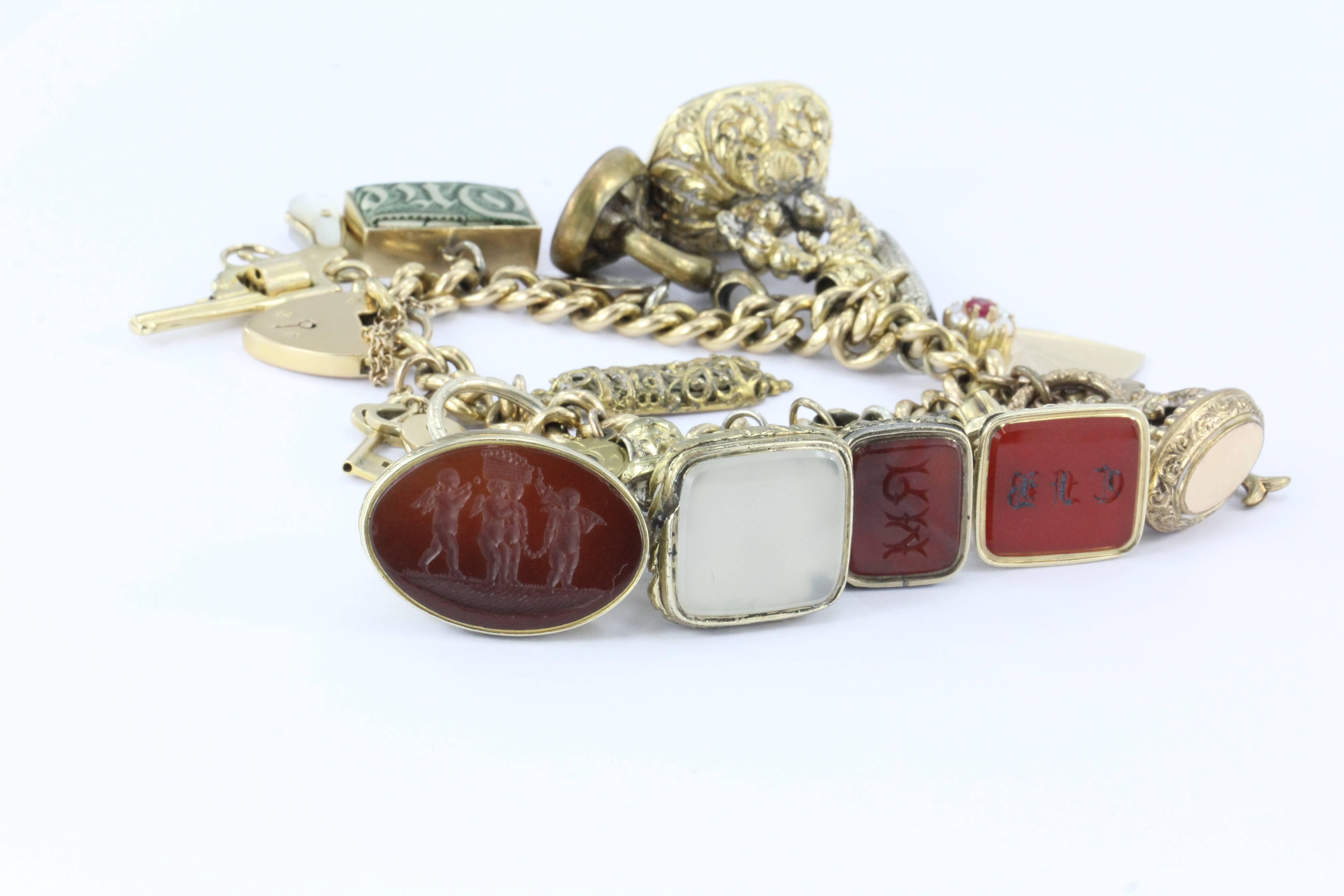 Women's Unique Gold English Tassie Seal Loaded Charm Bracelet