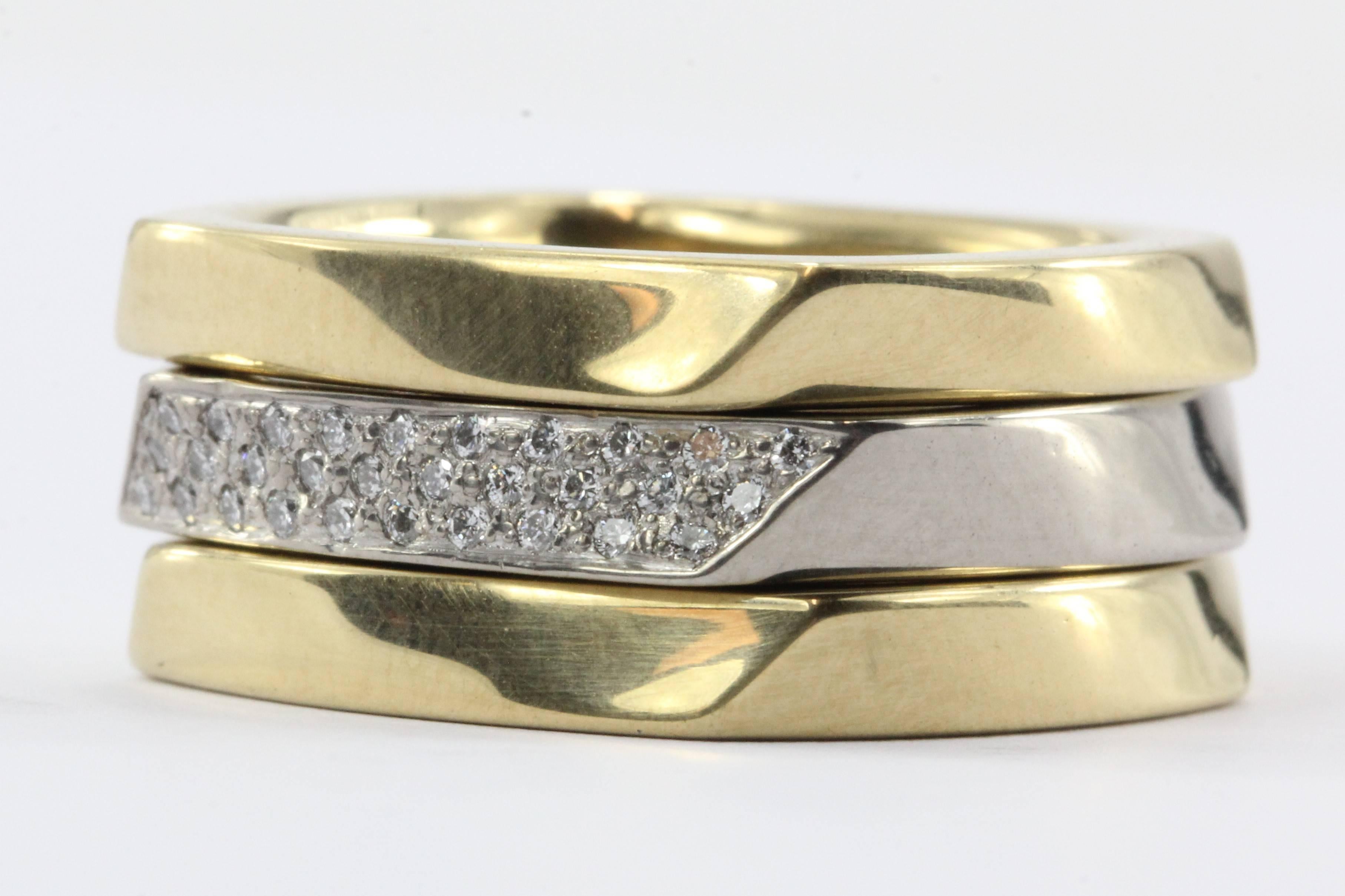 Set of 3 Tiffany & Co 750 18K White & Yellow Gold Frank Gehry Torque Ring Bands. The rings are in excellent estate condition and ready to wear. They were all just professionally buffed and polished and have no signs of wear. They come in their