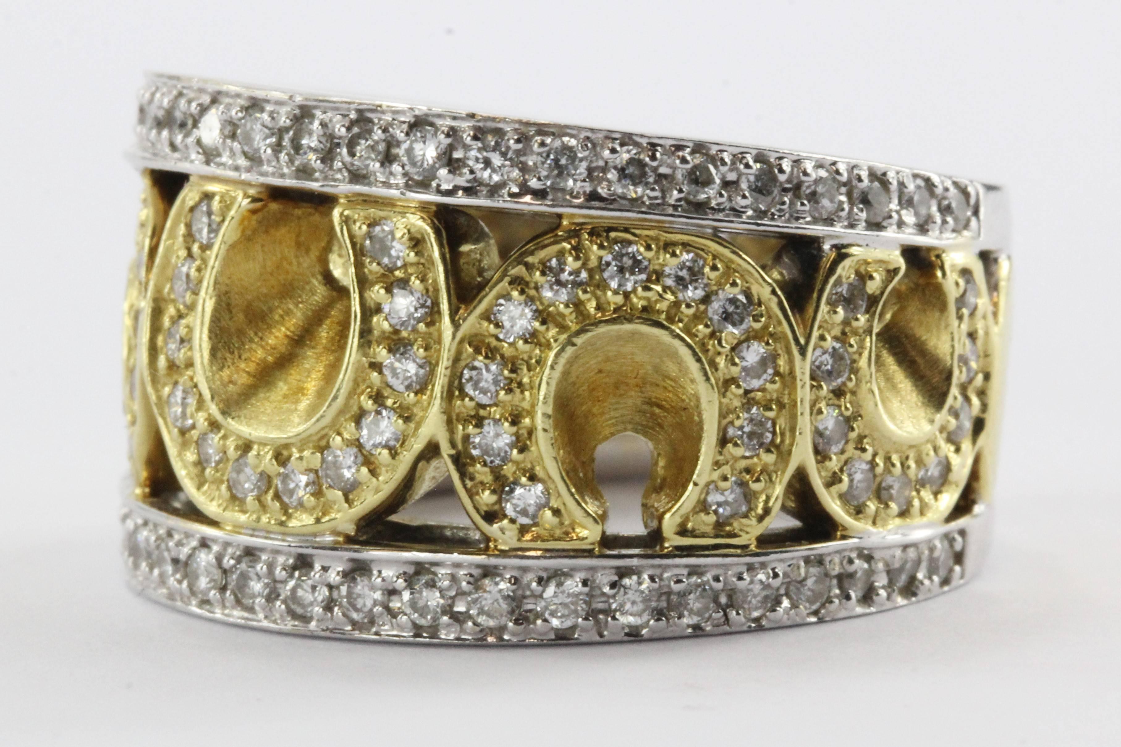 18K White & Yellow Gold Sonia Bitton 1.5 Carat Diamond Horseshoe Ring. The ring is in great used estate condition and ready to wear. There are signs of wear on the sides of the ring. The ring is signed Sonia B. 18K. It is set with approximately 1.5