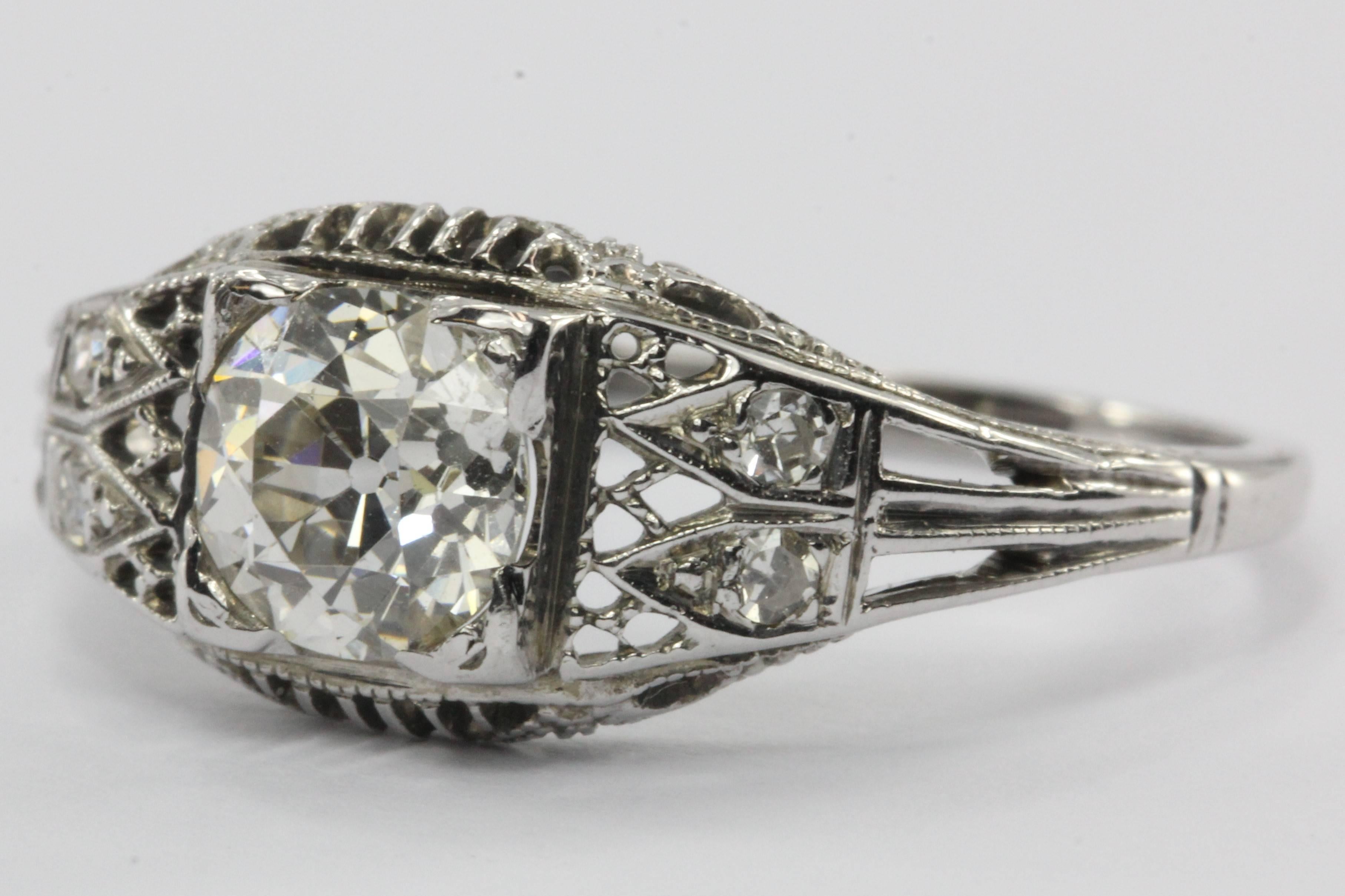 Antique Art Deco 18K White Gold 1.05 Carat Old European Diamond Ring. The ring is in excellent estate condition and ready to wear. It is hallmarked 18K. The center old European cut diamond is approximately 1.05 carats, 1/J color Vs2/Si1 clarity.