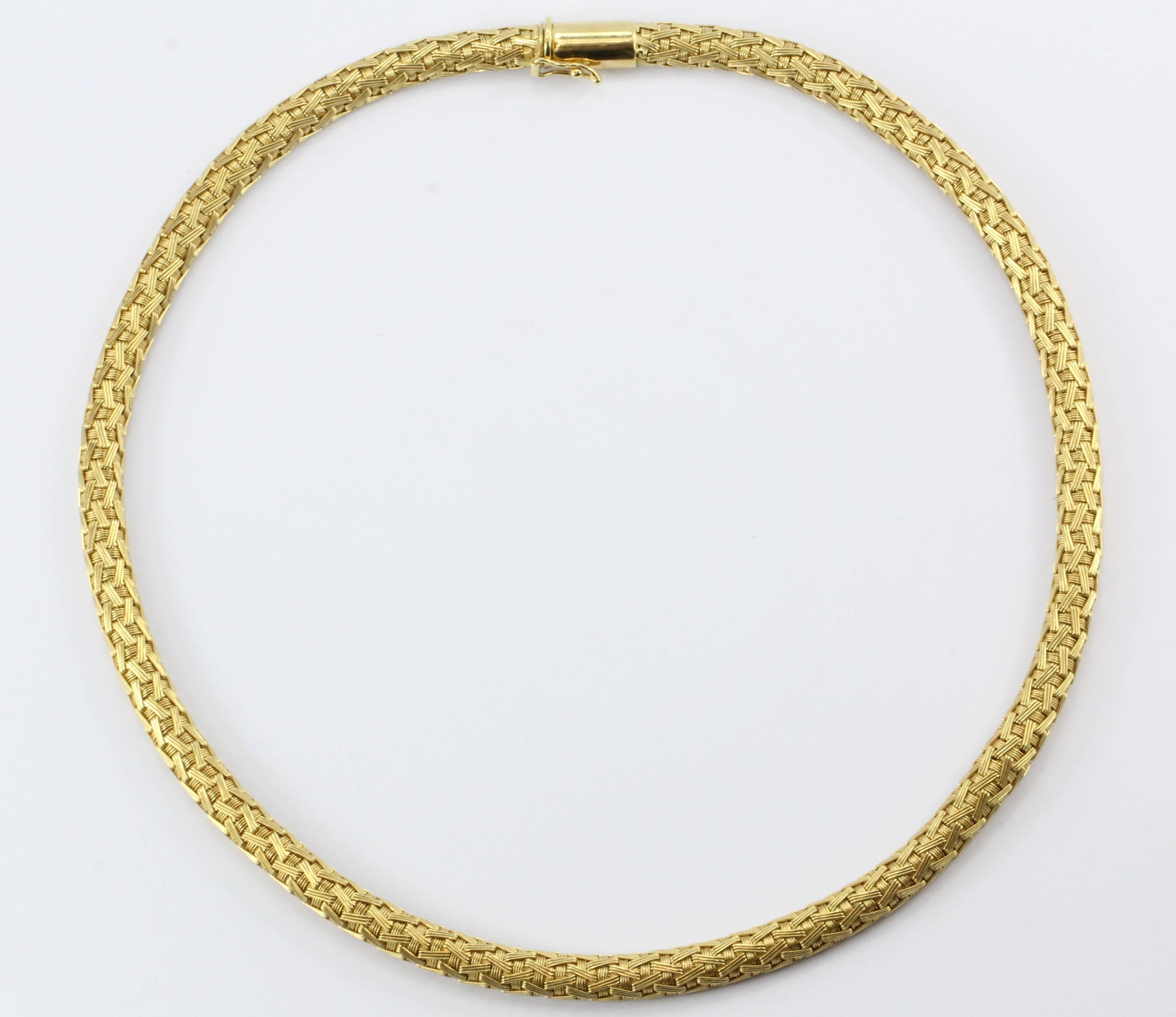 Vintage Roberto Coin 18K Gold Woven Silk Necklace. The necklace is in excellent estate condition and ready to wear. It is signed 