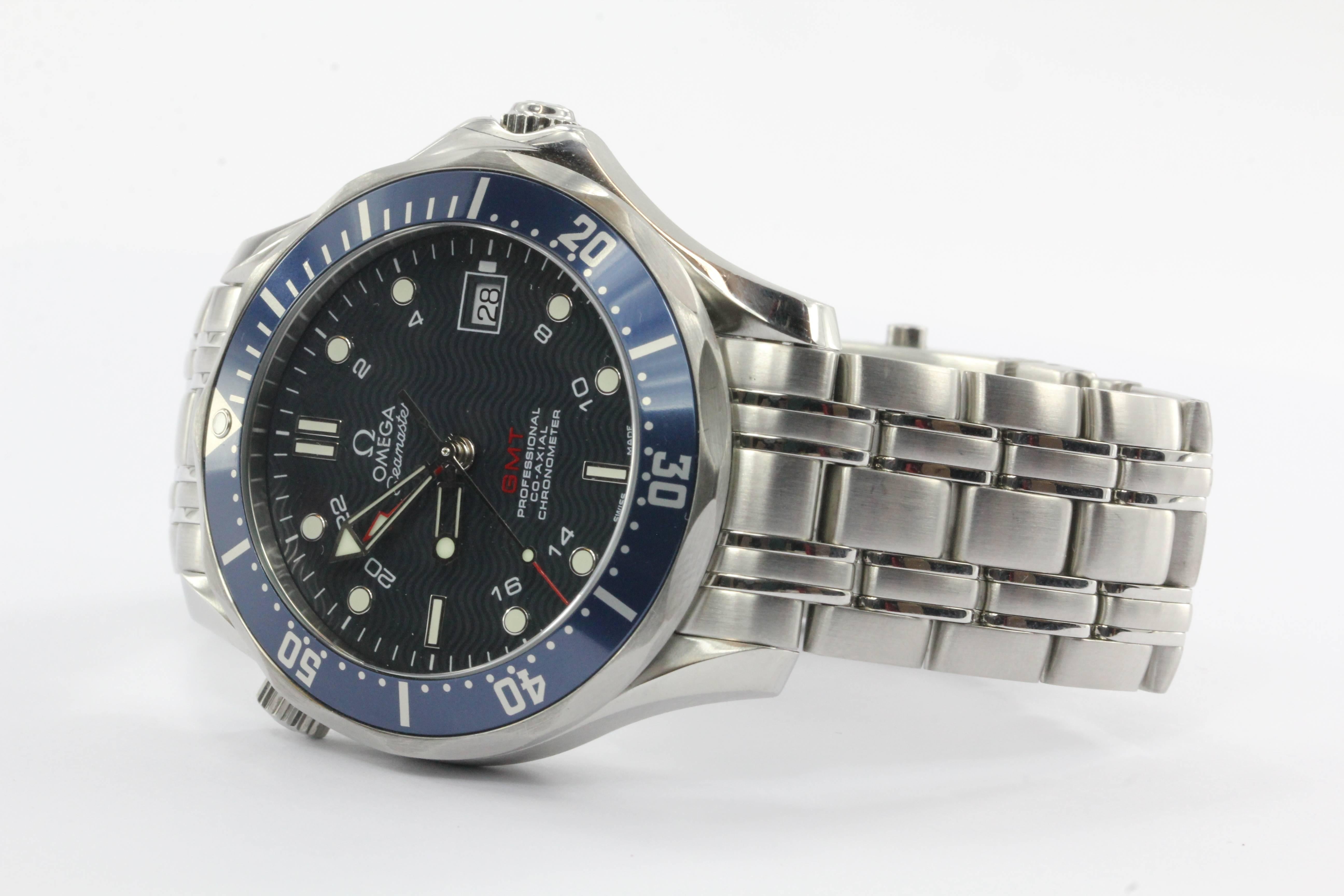 Omega Model 2535.80 Seamaster Professional 300M Blue Wave Dial Watch w/ Box. The watch is in excellent estate condition and ready to wear. It comes with its original box and paperwork. It was serviced by Omega in 2014 and comes with the service