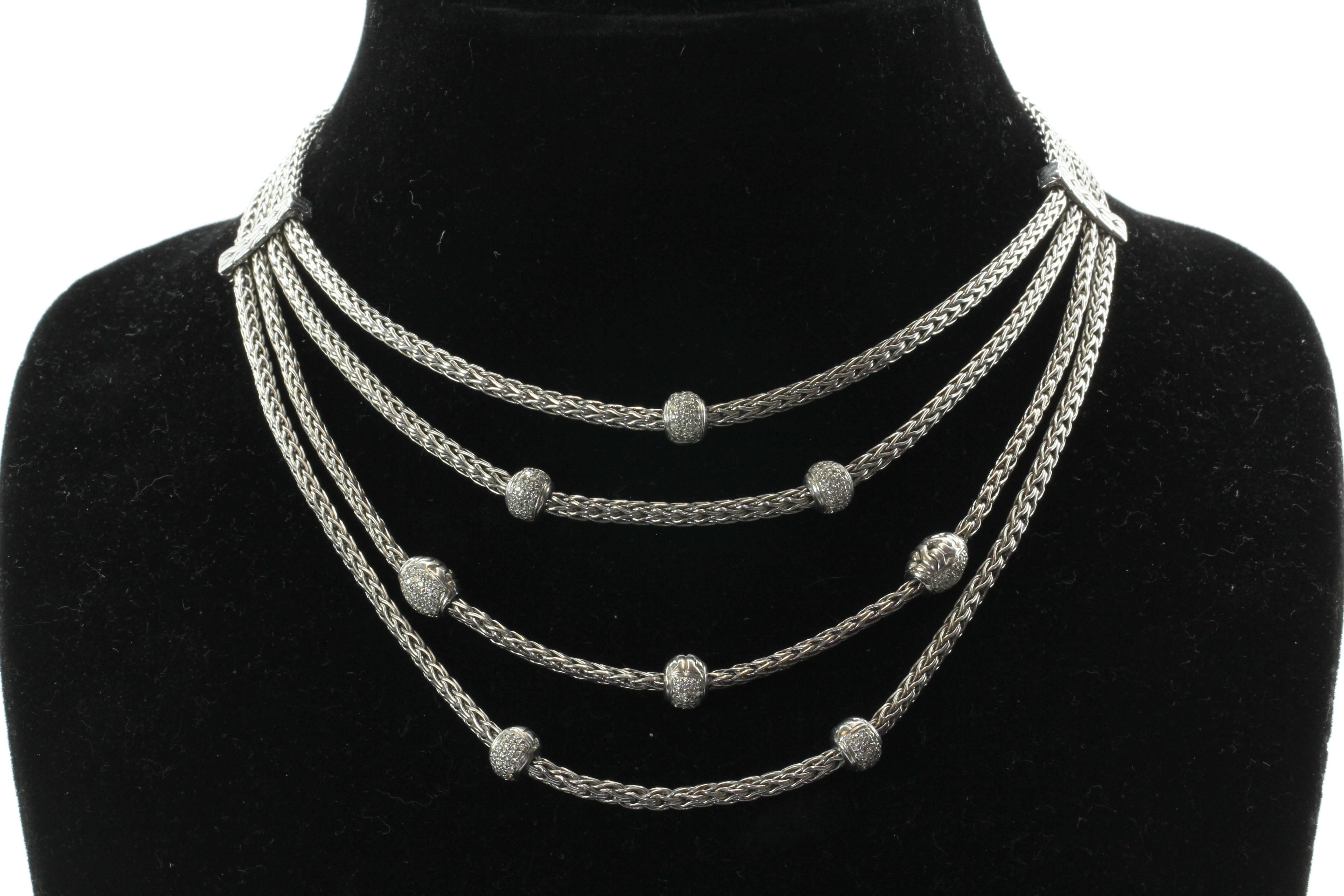 John Hardy Sterling Silver & Diamond 8 Station Bali Classic 4 Row Necklace. The necklace is in excellent used estate condition and ready to wear. The piece was purchased in the John Hardy Bali Showroom where each piece is artisan crafted. The piece