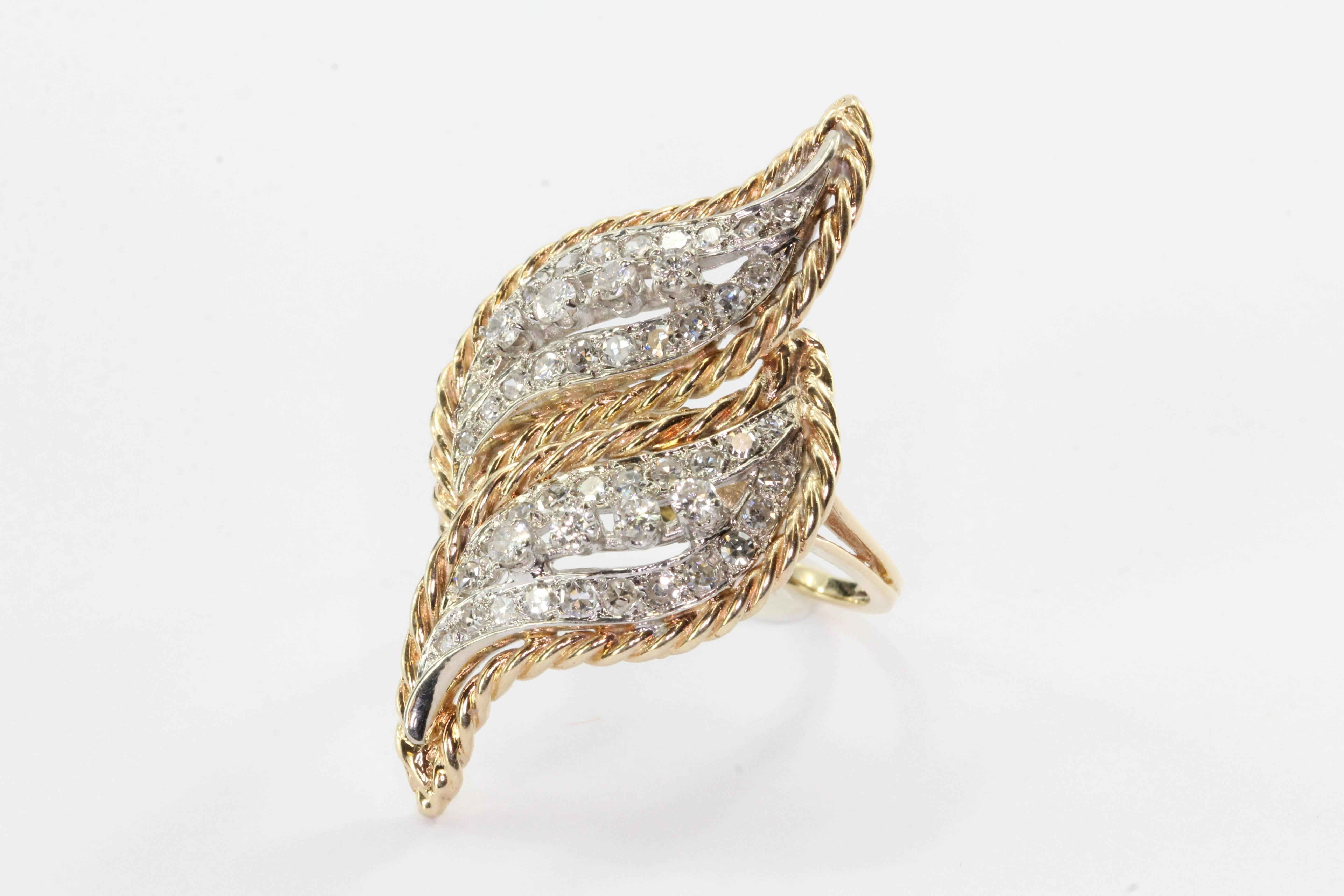 Vintage Retro 14K White & Yellow Gold Diamond Chunky Conversion Ring. The ring is in excellent estate condition and ready to wear. The ring was professionally converted from a necklace clasp into a ring. It is set with approximately 1.28 carats of