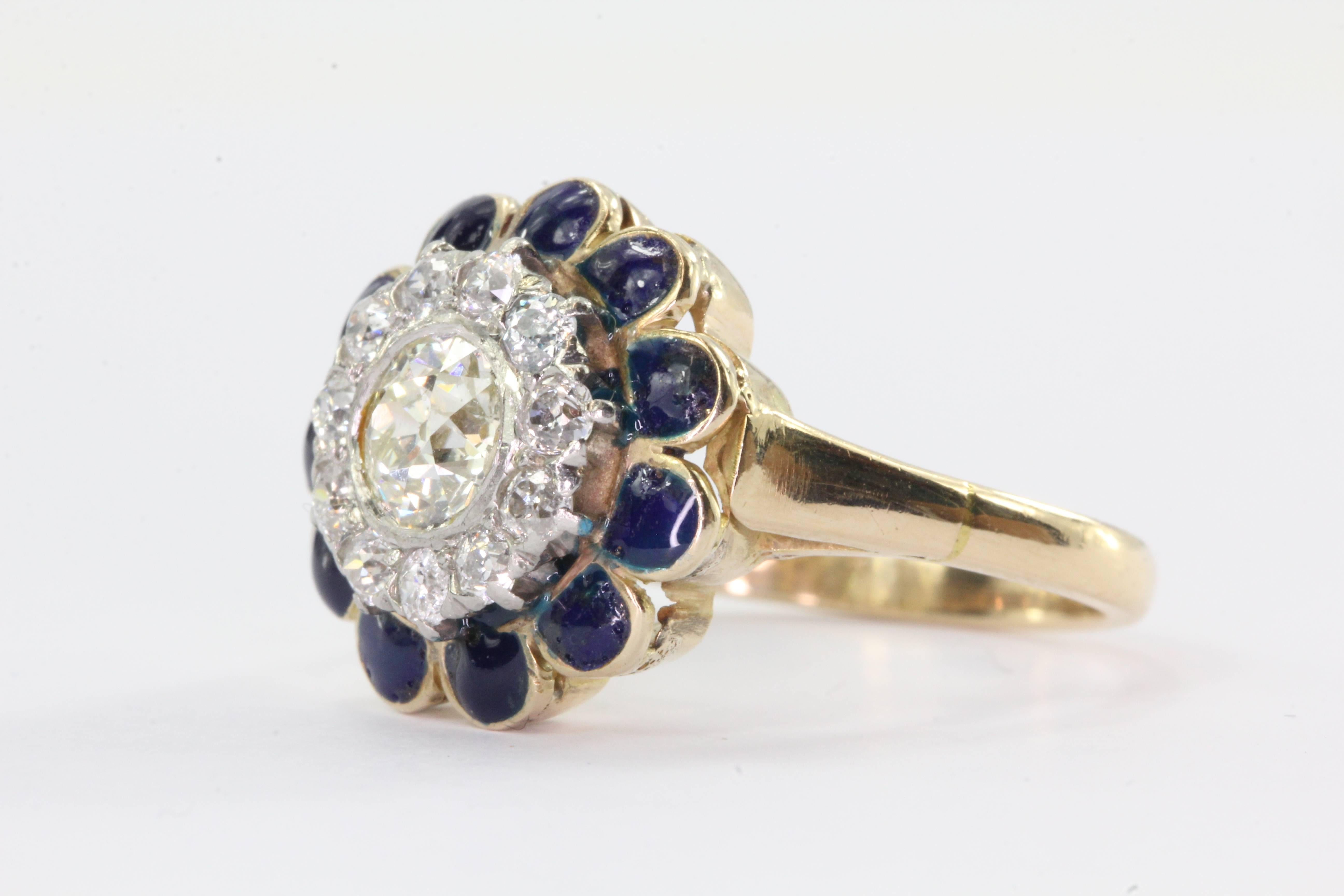 Antique Art Deco 14K Gold Old European Cut Diamond & Blue Enamel Ring. The ring is in excellent estate condition and ready to wear. The ring is hallmarked 14K. It is set with an approximately .54 carat, Si1 clarity, K color old European cut diamond