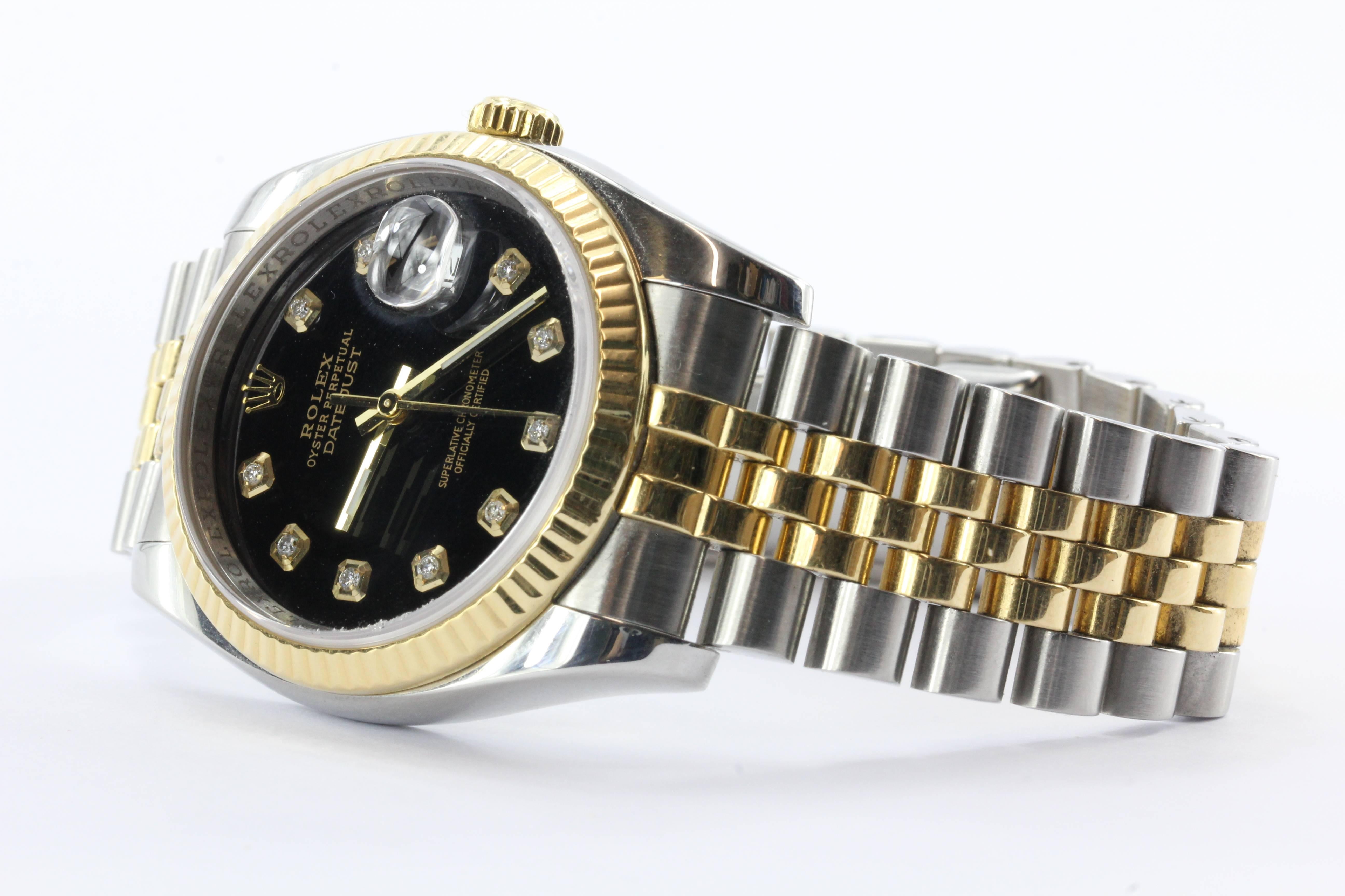 Rolex Oyster Perpetual Date Just 116233 Steel & 18K Gold Diamond Black Watch. The watch is in excellent gently used estate condition, keeping great time and ready to wear. Comes with original box but no paperwork. The case is 18K yellow gold and