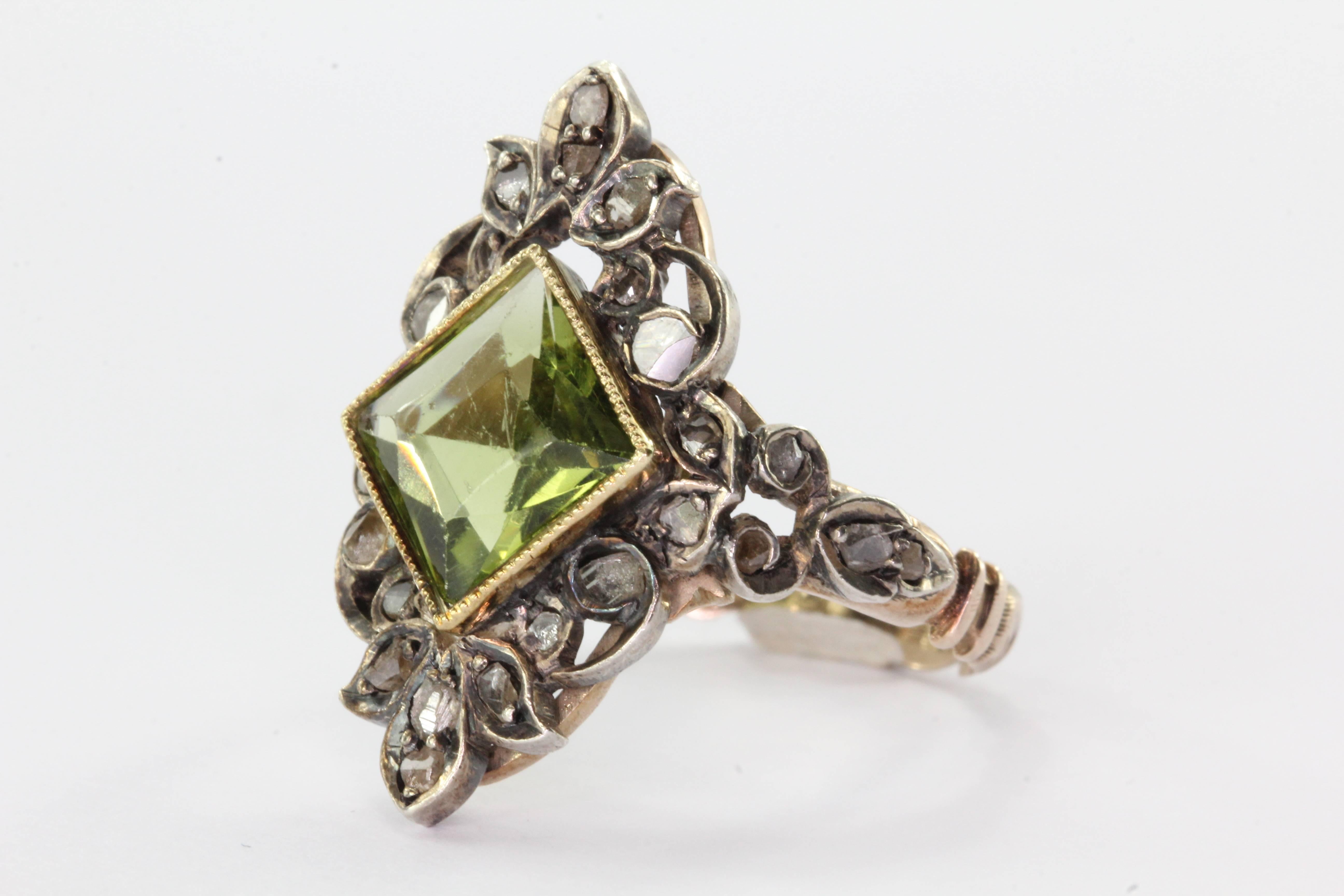 Antique Georgian Rose Cut Diamond Gold & Silver Green Paste Ring. The ring is in excellent estate condition and ready to wear. There is some wear to the paste stone but the rest of the ring is perfect. The shank, band and paste mounting are 9ct