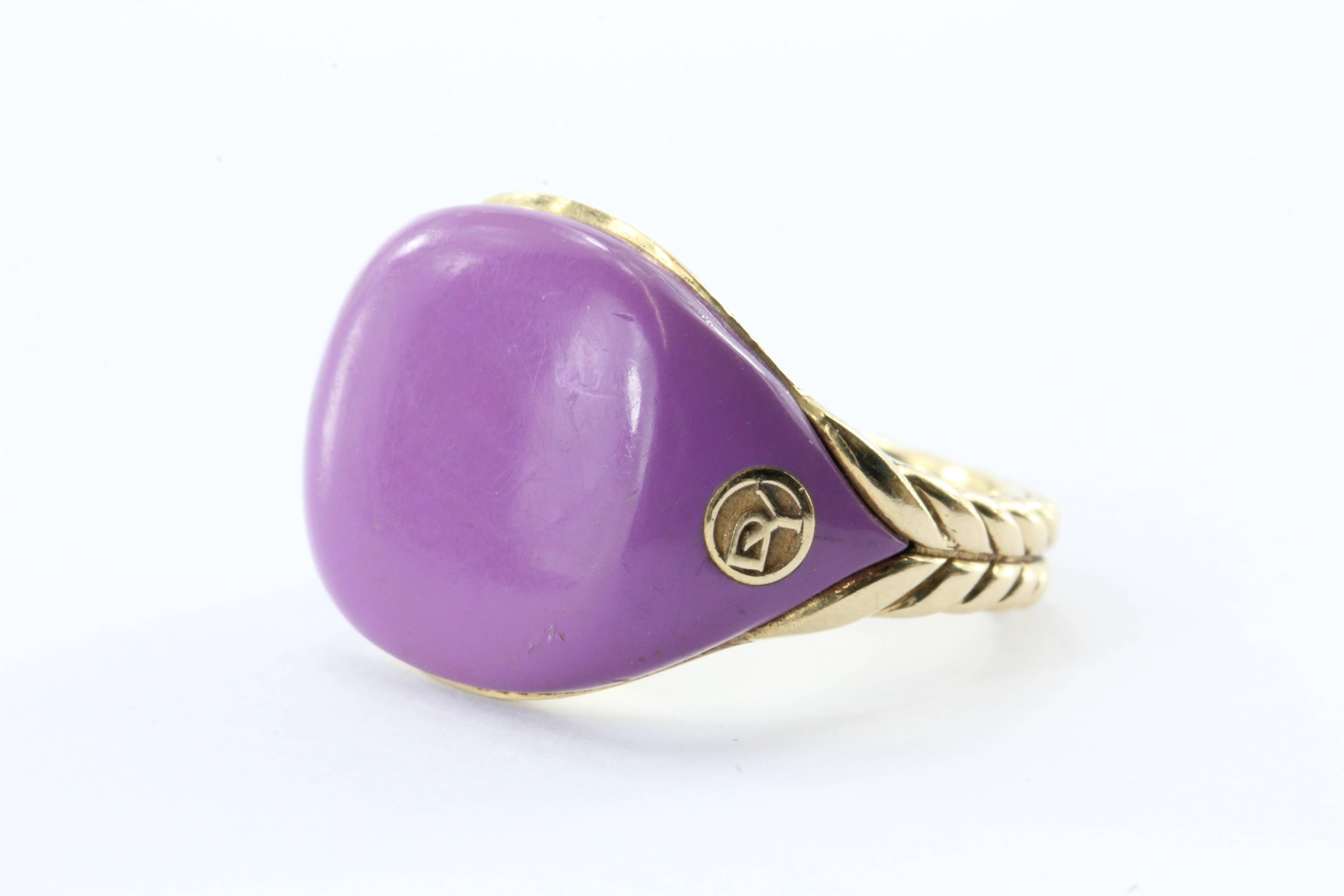 David Yurman 18K Gold Bubblegum Purple Pinky Ring Limited Edition. The ring is in great used estate condition and ready to wear. There are some scuffs to the resin that are noticeable upon close inspection. The ring is signed DY 750. The ring is a