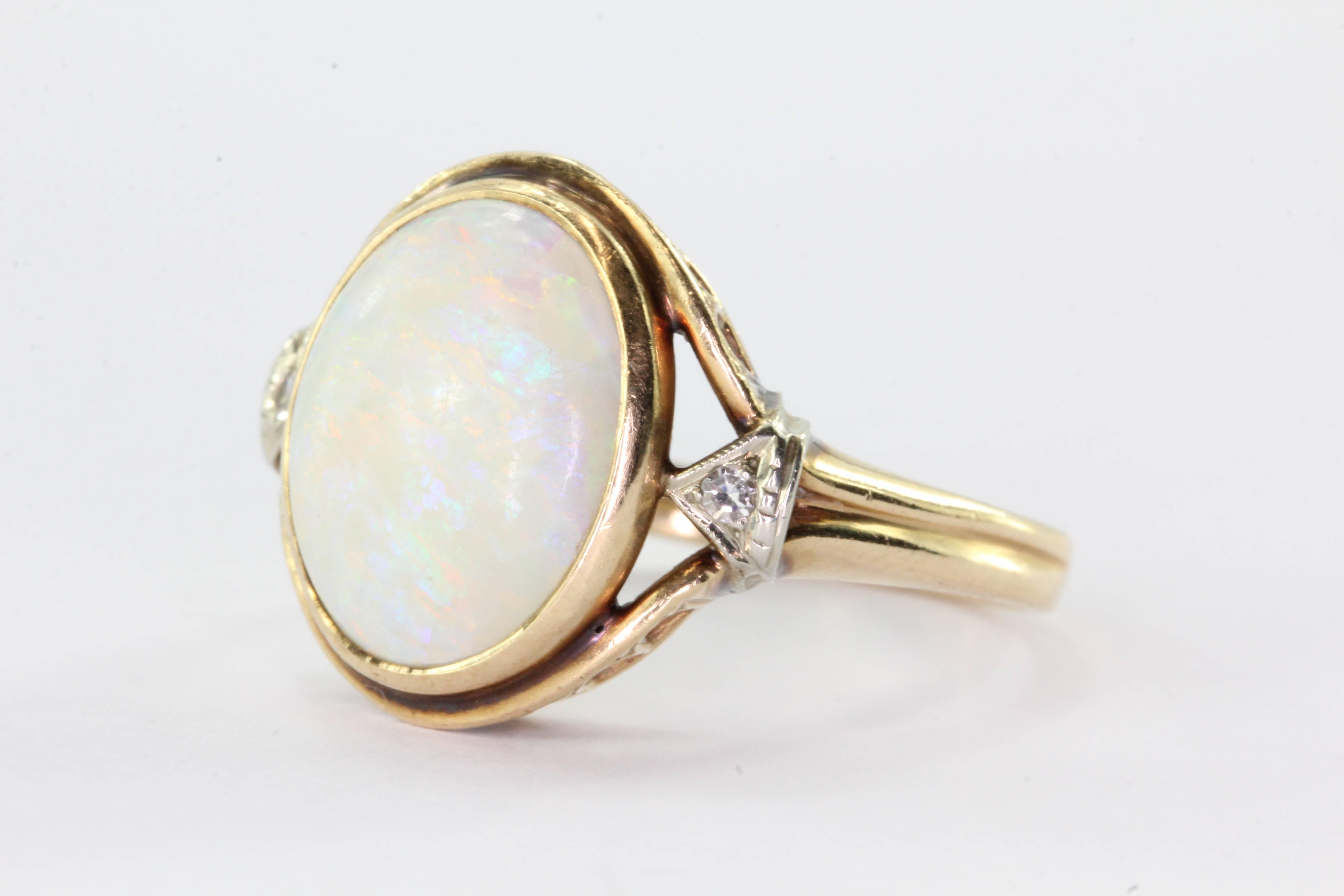 Antique Gothic Revival 14K Gold Opal & Diamond by Church & Co. The ring is in great antique estate condition and ready to wear. There are some signs of wear to the opal. The ring is hallmarked 14K and the makers mark for Church & Co of Newark NJ.