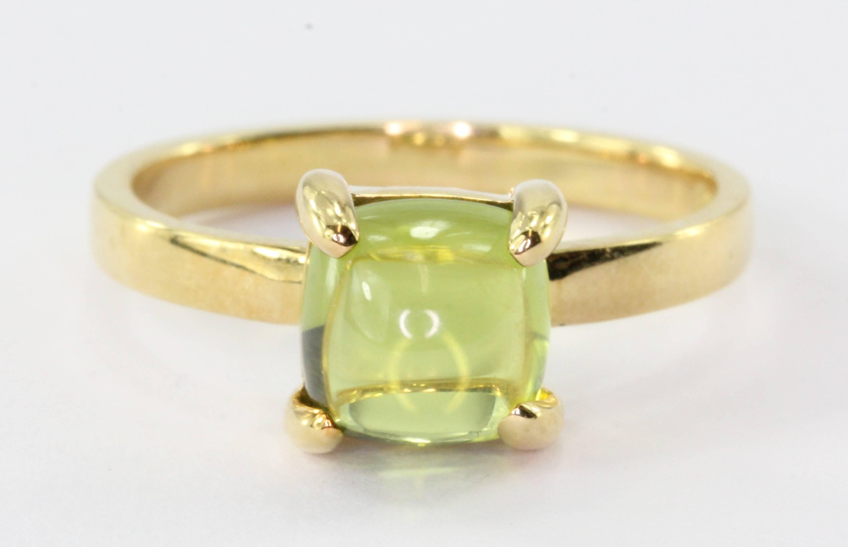 Tiffany 18K Gold Paloma Picasso Sugar Stack Peridot Ring. The ring is in excellent used estate condition and ready to wear. It does not come with a box or pouch. The ring is signed "Paloma Picasso Tiffany & Co 750". The ring is a size