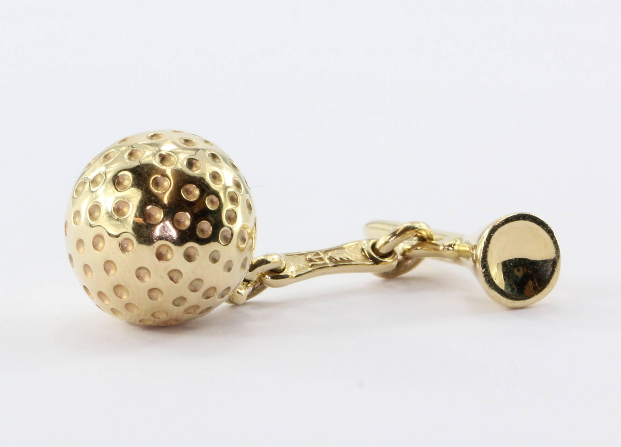 14K Gold Golfball & Tee Cufflinks. The cufflinks are in excellent estate condition and ready to wear. They are hallmarked 14K and a makermark. The golfballs measures .55" in diameter, the tee measures about .80" and together they weigh