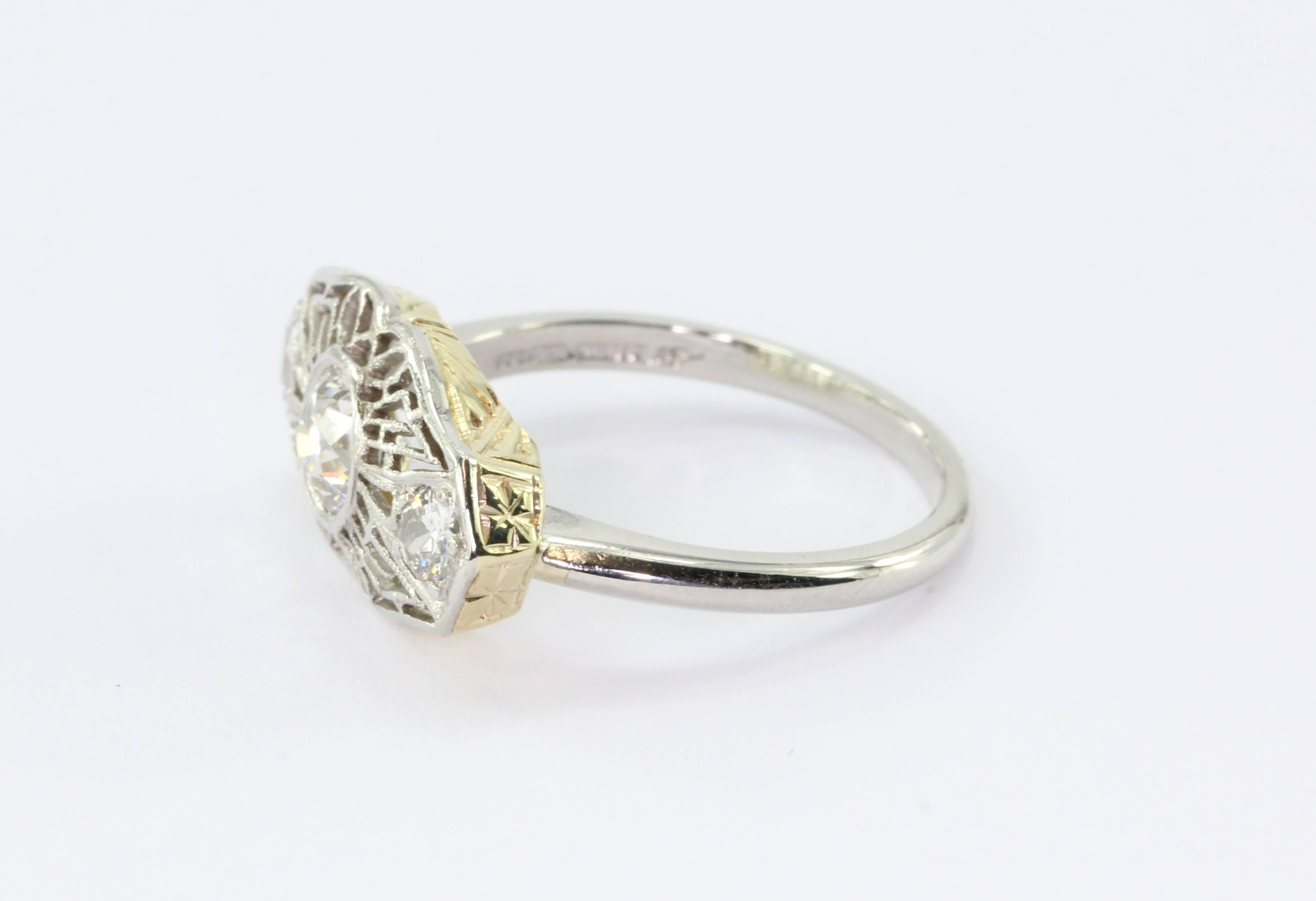 Art Deco Platinum 14K Yellow Gold Old Mine Cut Diamond Stick Pin Conversion Ring. The ring is in excellent estate condition and ready to wear. The ring was originally a stick pin which was professionally converted into a ring using the pin top and