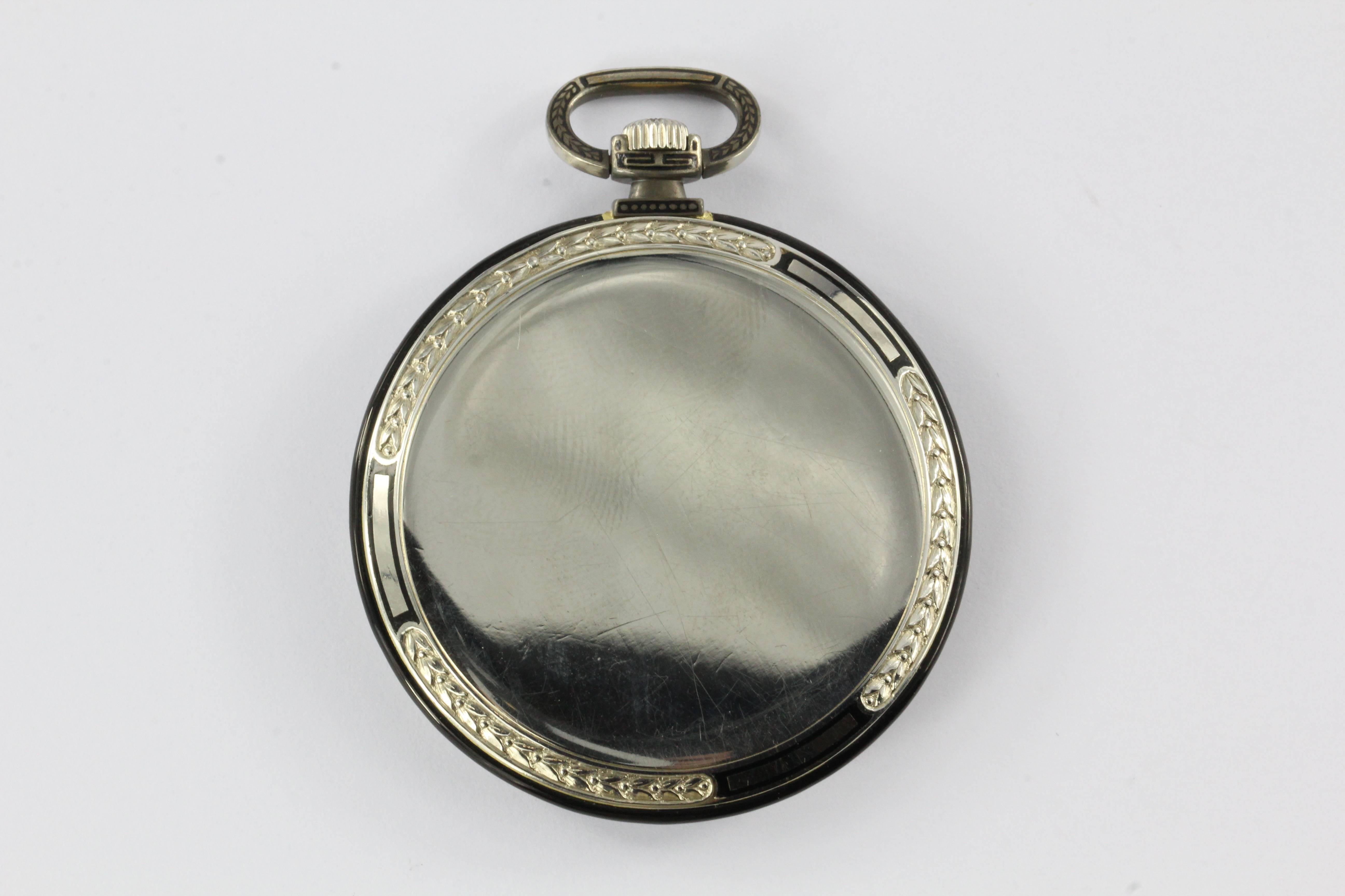 Art Deco 18K White Gold Black Enamel Ultra Thin Pocket Watch c.1924

The watch is in excellent estate condition, running great and ready to use. The case is 18k white Gold with black enamel decoration. The enamel work in excellent condition. The