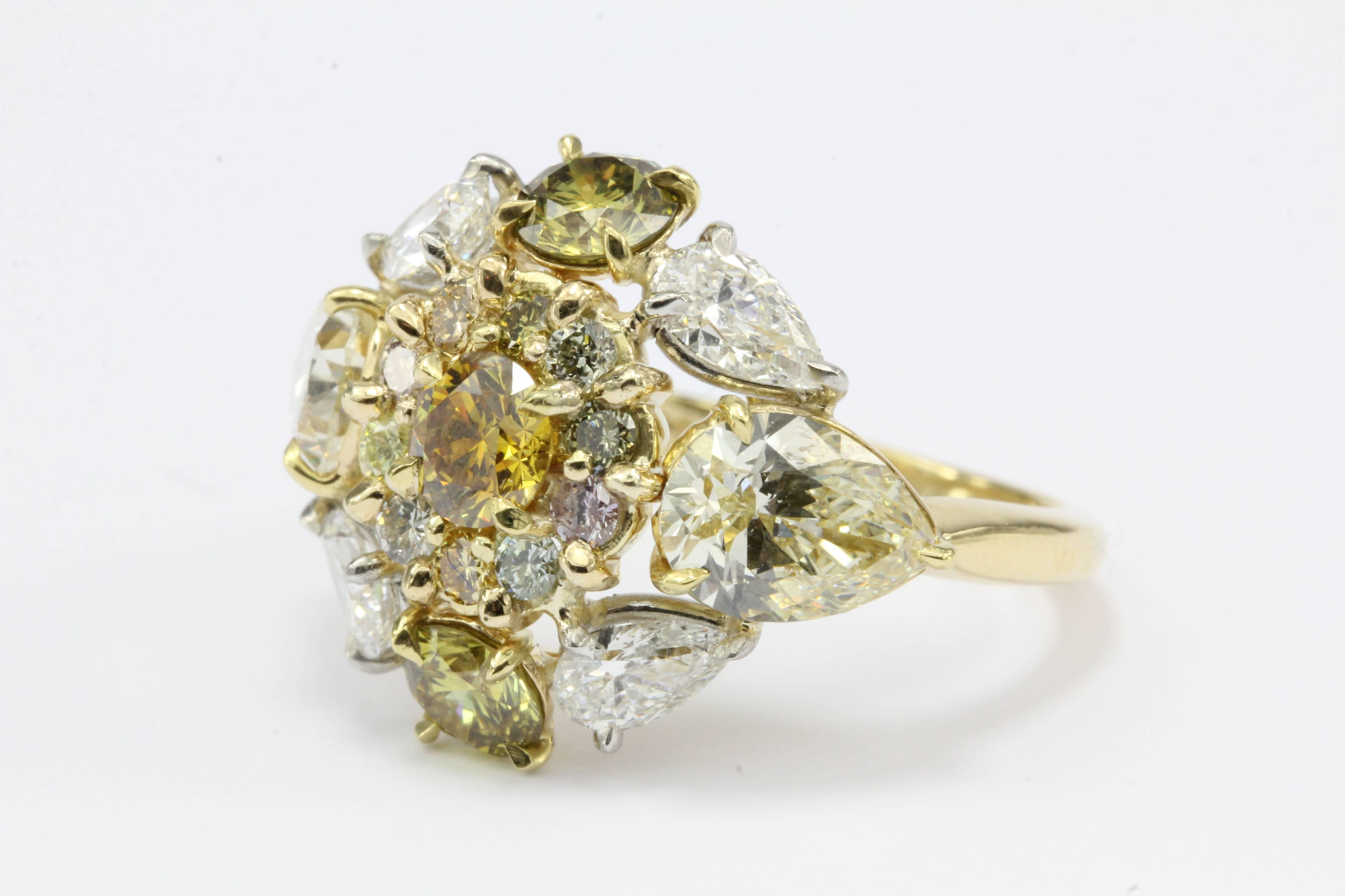 Fancy Yellow & White Diamond 18K Gold & Platinum 5CTW Ring

Like a field of freshly blooming dandelions glistening with dew in the morning sun this ring has the power to take you to your happy place. There are approximately 5 carats of