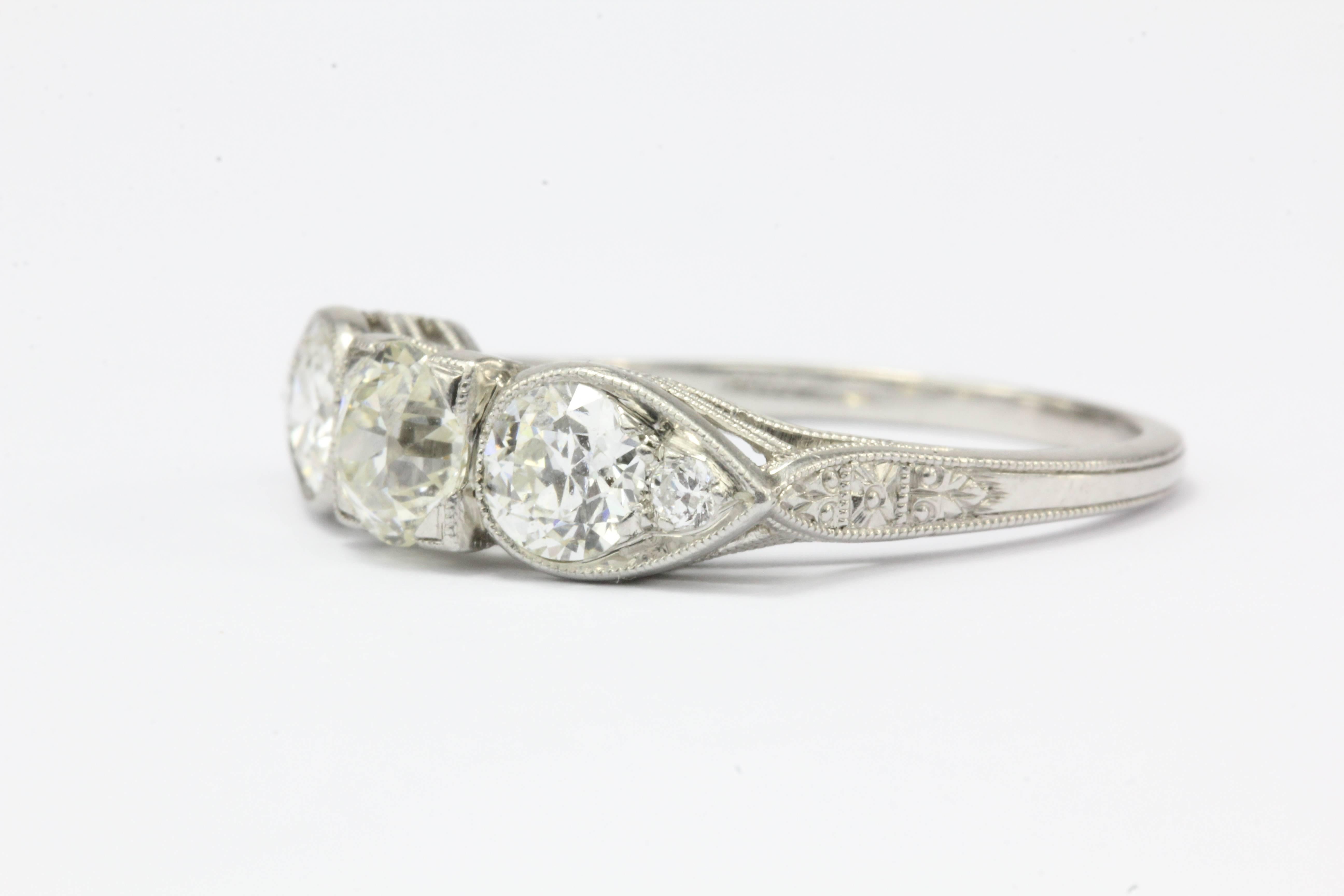 Edwardian Platinum Old European Cut Diamond Engagement Ring 1.31CTW

The height of Edwardian opulence this ring is the grandest understatement one can put on their finger. Made of platinum and set with 5 old European cut diamonds that all sparkle