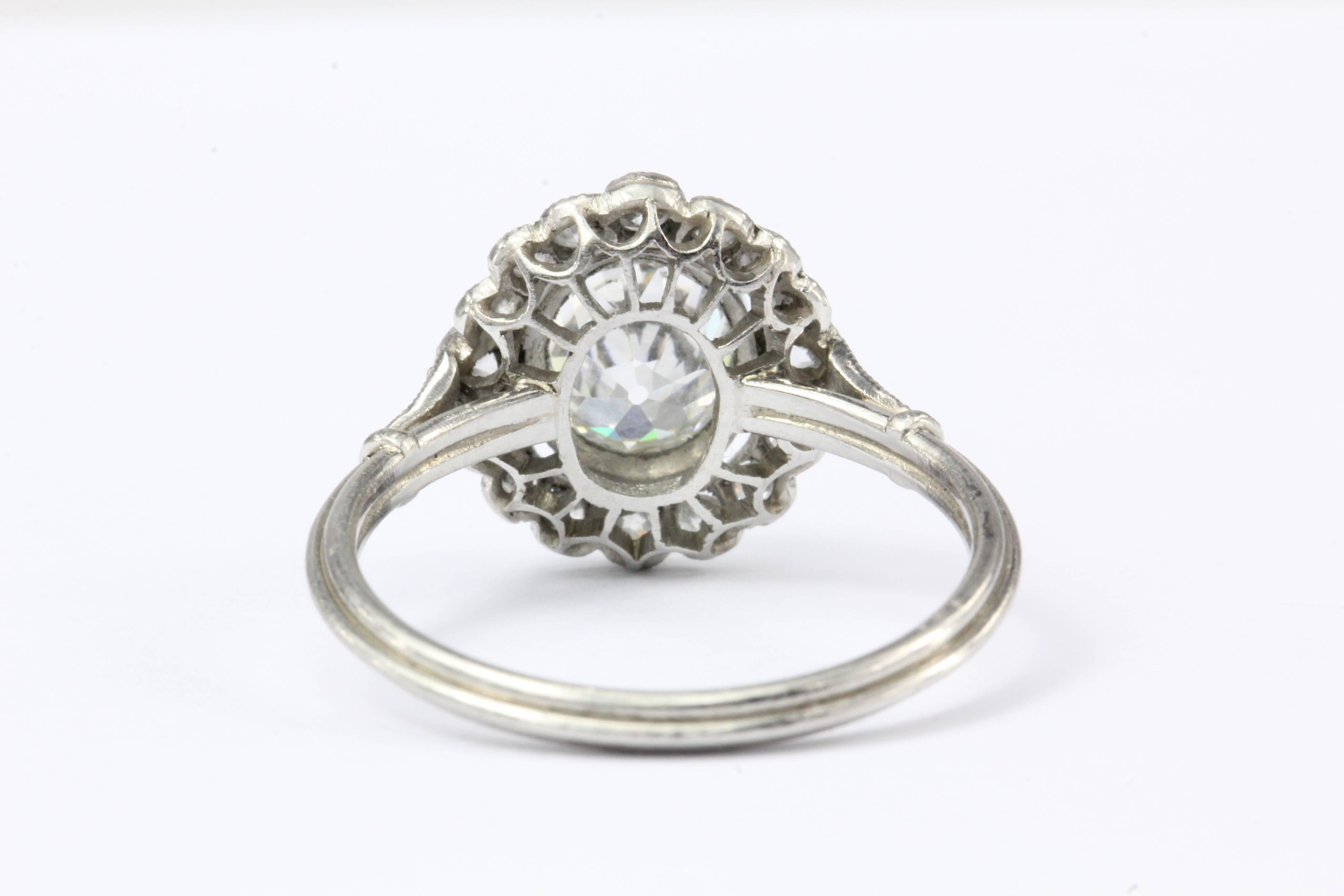 Edwardian Platinum Old Mine Cut Diamond Halo Engagement Ring, circa 1910 In Excellent Condition In Cape May, NJ