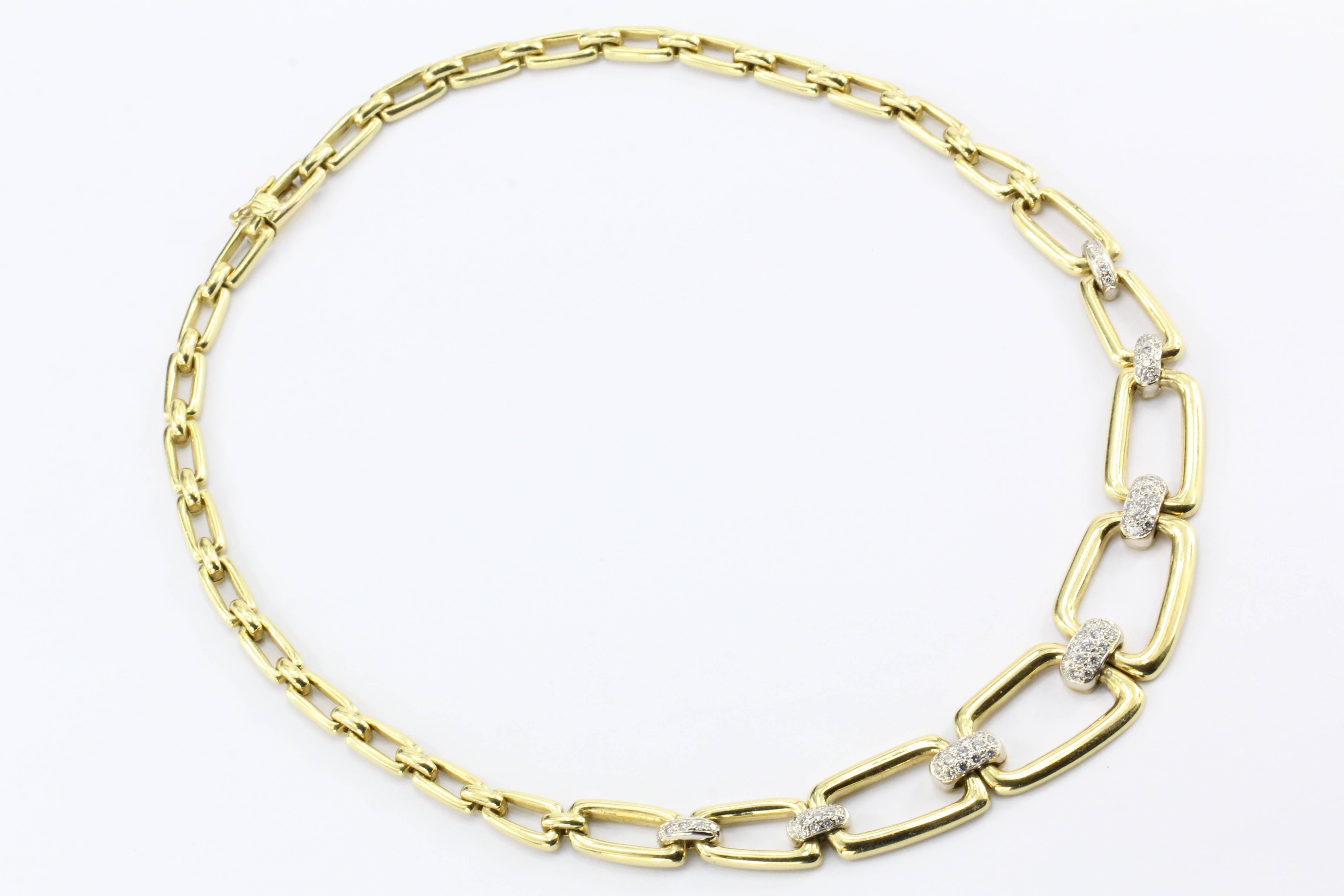 Vintage 18k Gold Graduated Chain Link Diamond Necklace

Era: Modern c.1980's

Hallmarks: 18K

Composition: 18k Yellow Gold

Primary Stone: Diamonds

Stone Carat: 1.5 ctw

Color / Clarity: F/G - Vs1/2

Width Measurement: .75" at its