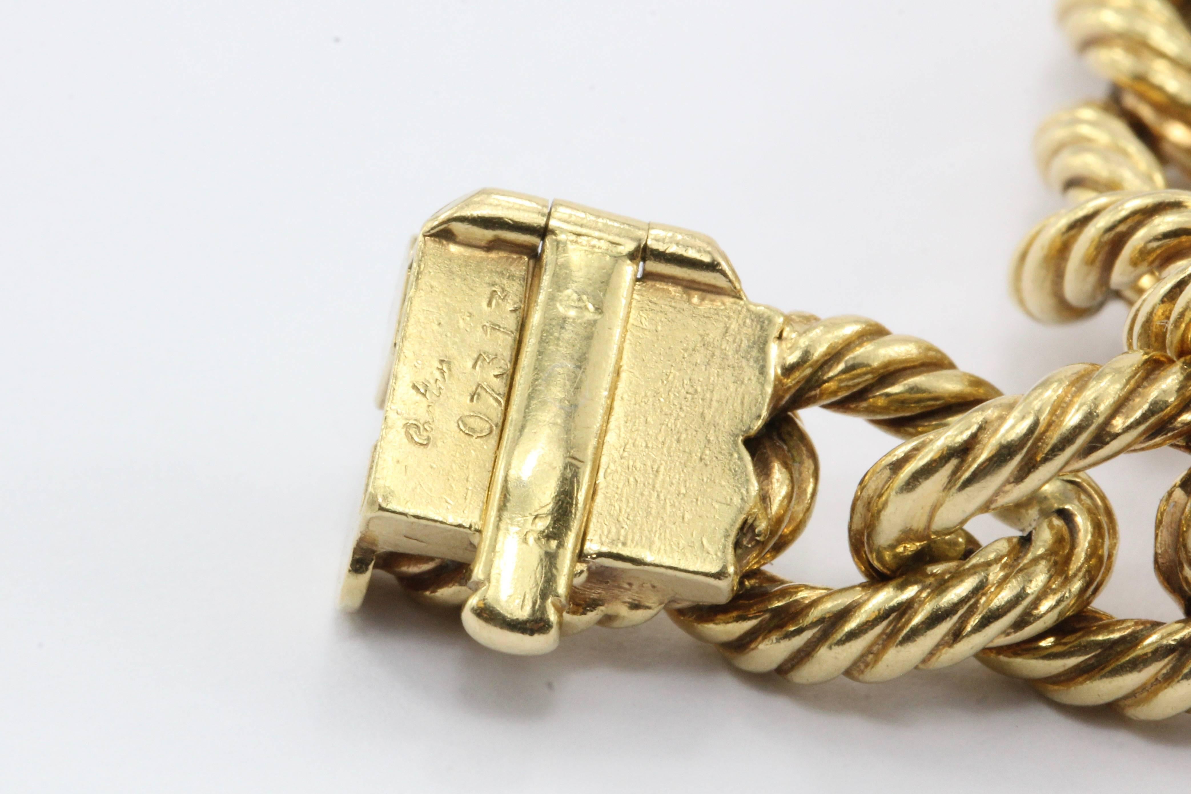 Cartier 18 Karat Gold French Retro Loaded Charm Bracelet, circa 1950s 3