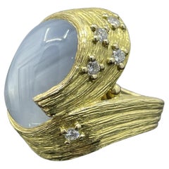 Anillo de cóctel de zafiro estrella de 34,27 ct en oro amarillo de 18k
