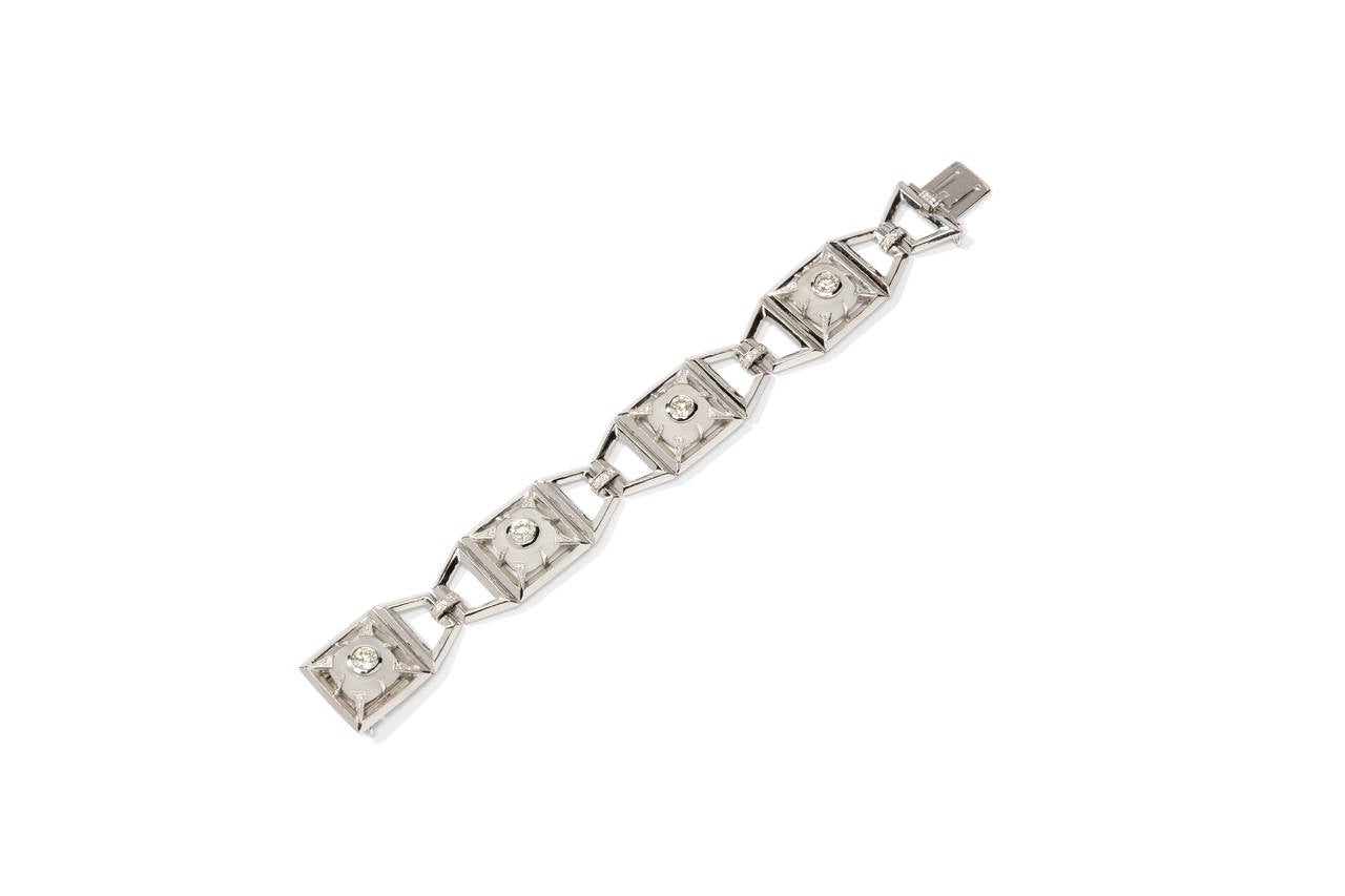 Germany 1960's. Composed of rock crystal, 4 brilliant-cut diamonds weighing approximately 2,04 ct. Accented by 36 small brilliant-cut diamonds weighing circa 0,30 ct. Mounted in 18 K white gold. Total weight: 52 grams. 
Length: 6.5 in ( 16,5 cm ),